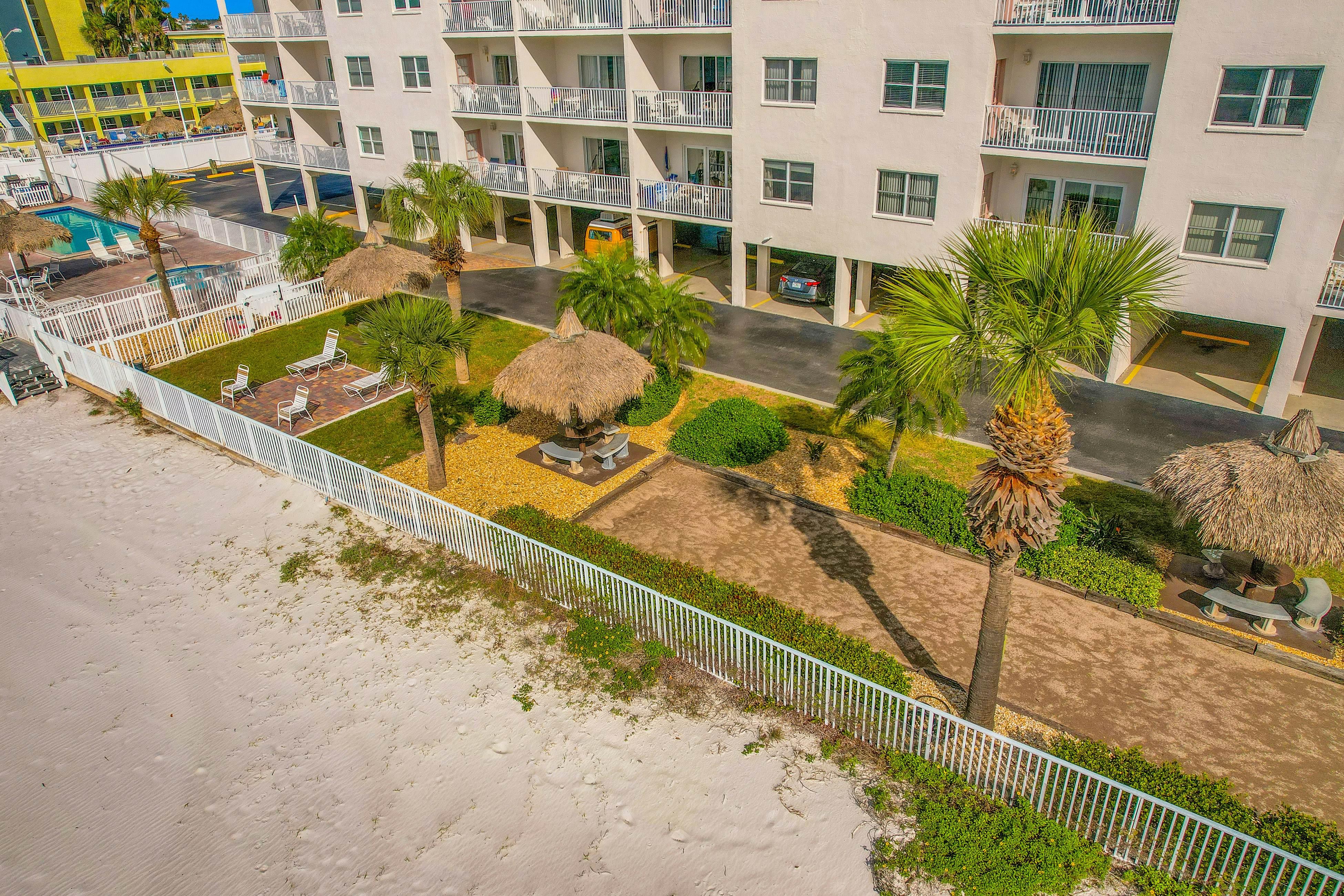 Upscale, beachfront condo with dual balconies, Gulf view, pool, hot tub & bocce