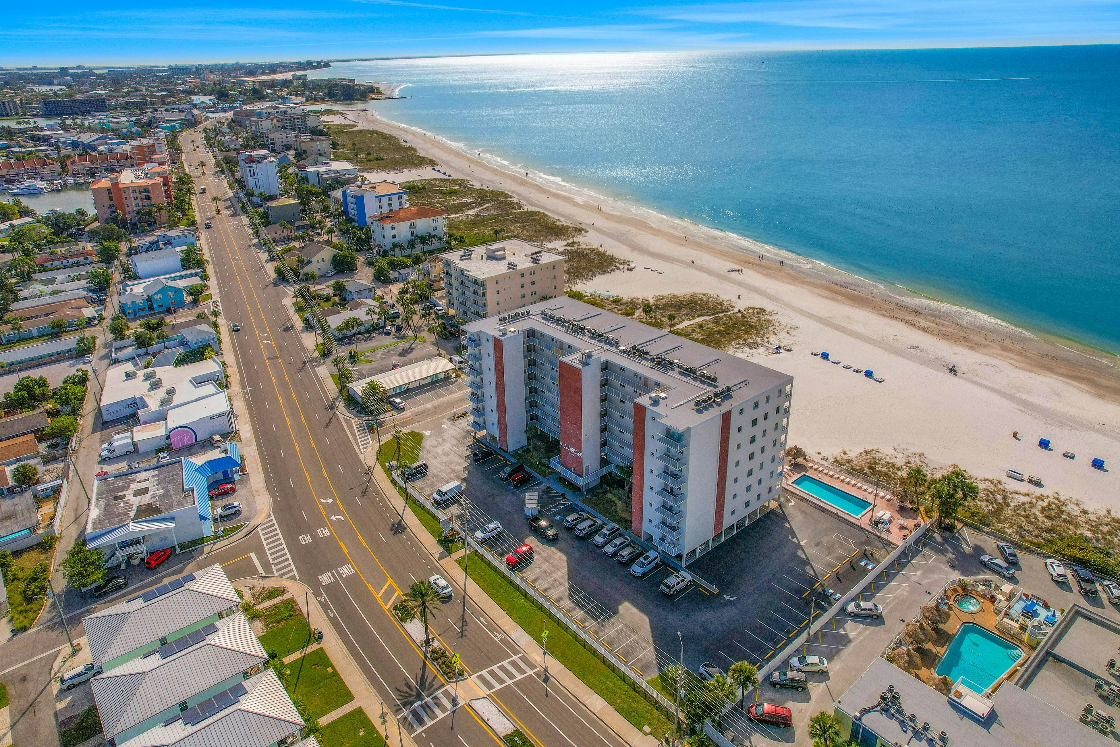 Upscale, beachfront condo with dual balconies, Gulf view, pool, hot tub & bocce