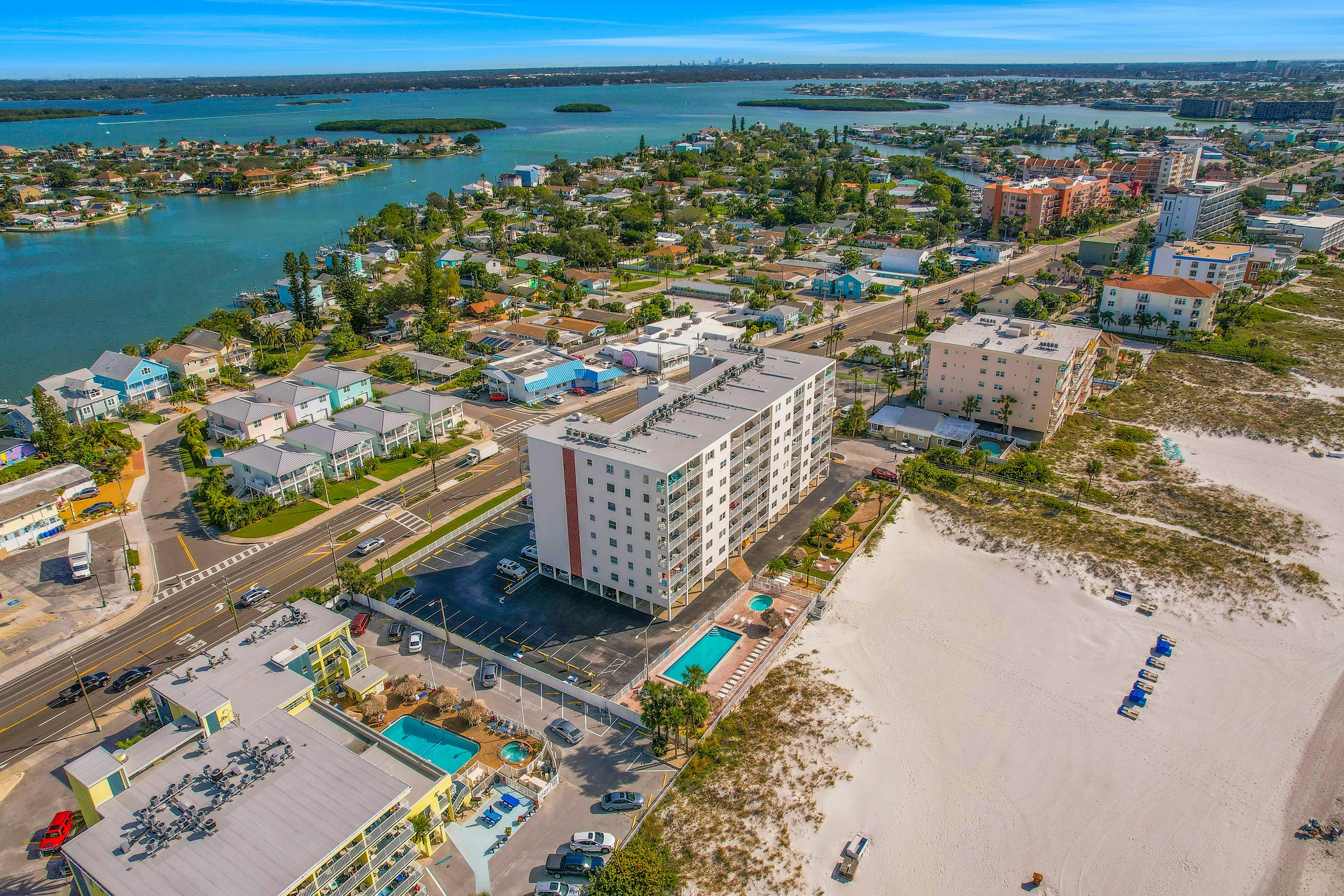 Upscale, beachfront condo with dual balconies, Gulf view, pool, hot tub & bocce