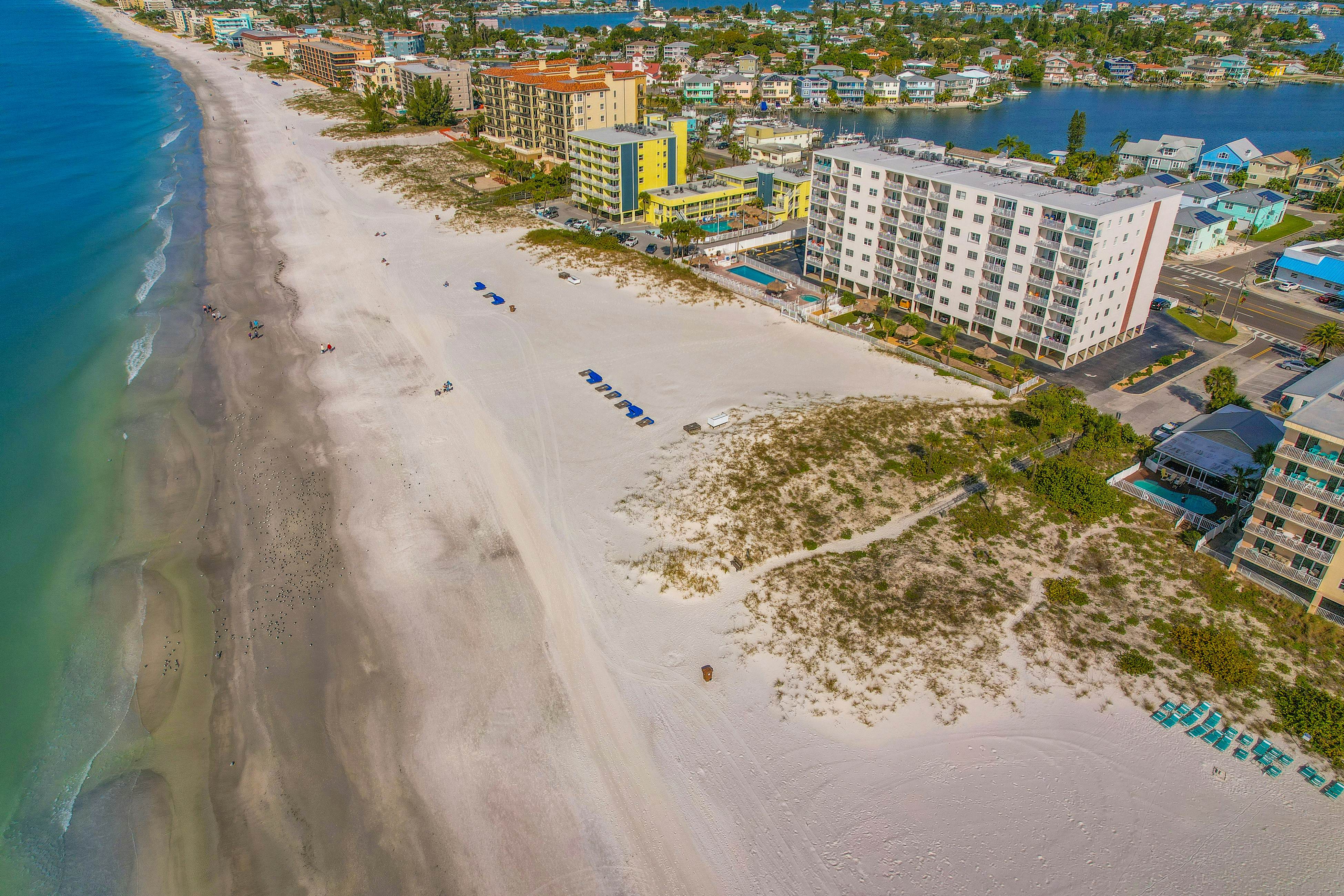Upscale, beachfront condo with dual balconies, Gulf view, pool, hot tub & bocce