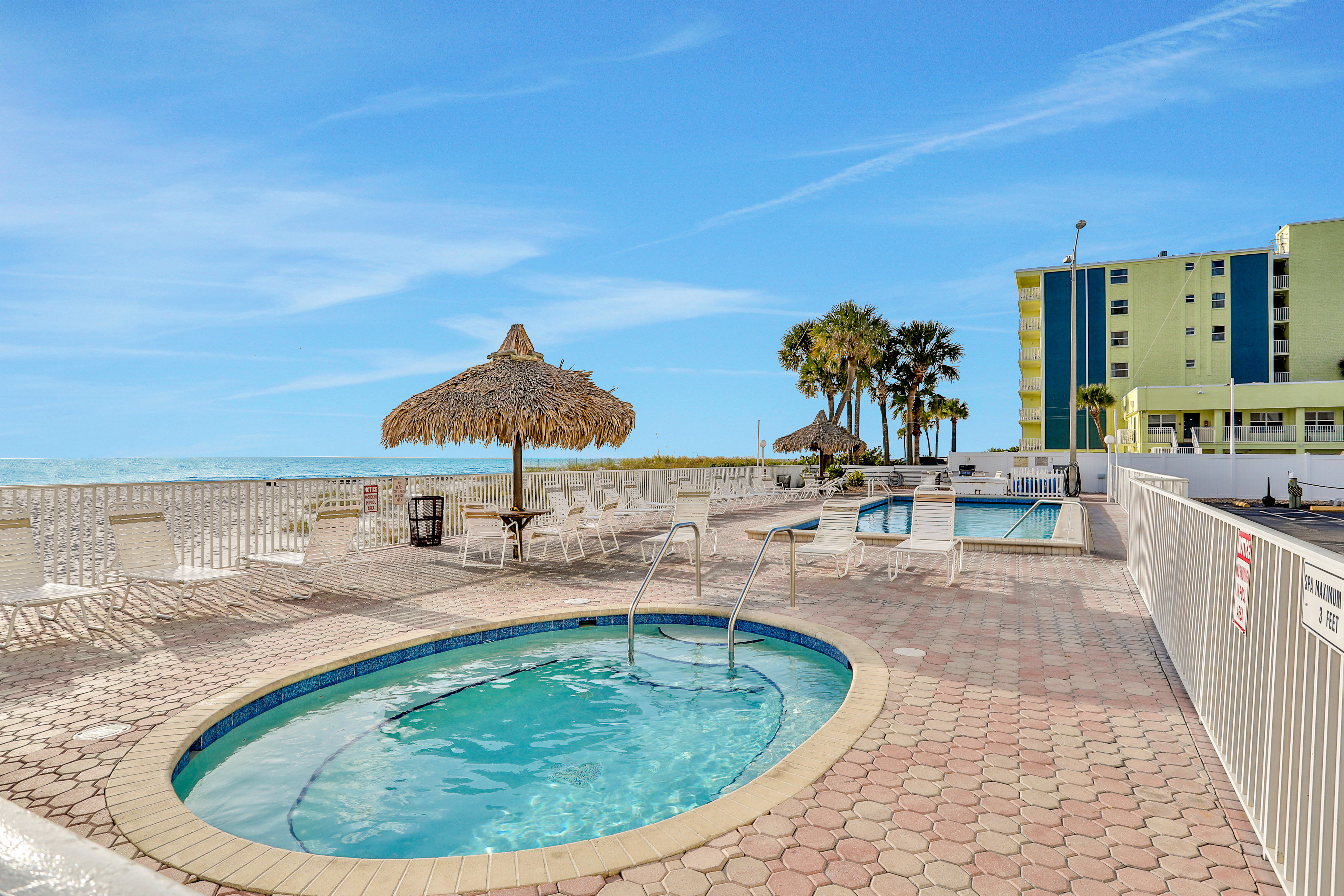 Top floor beachfront condo with Gulf views balcony pool hot tub and bocce