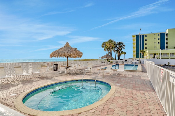 Top floor beachfront condo with Gulf views balcony pool hot tub and bocce