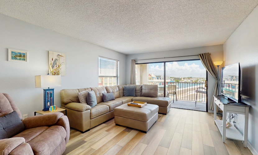 Newly renovated condo w private balcony gas grill and on site heated pool AC