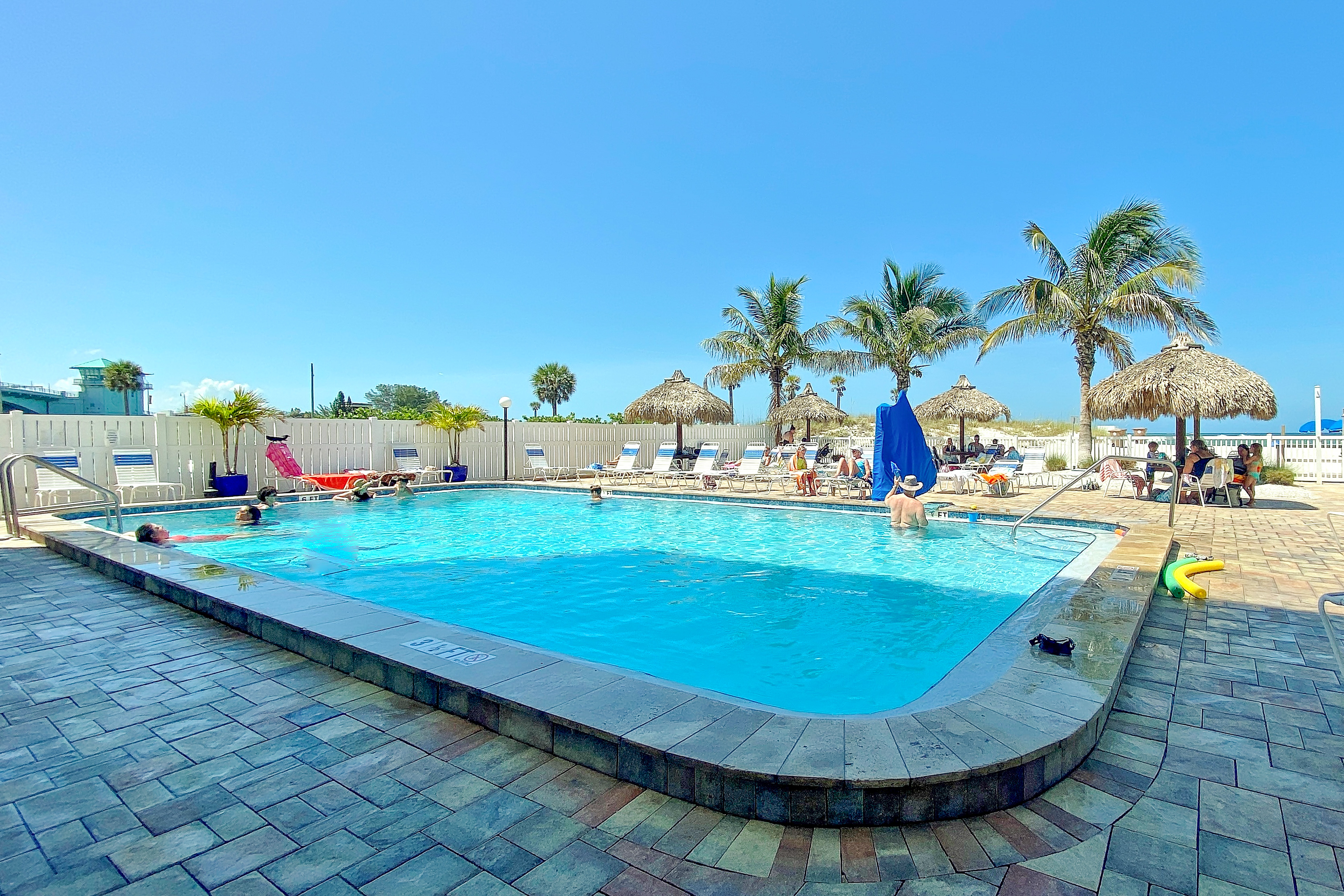 Newly renovated condo w private balcony gas grill and on site heated pool AC