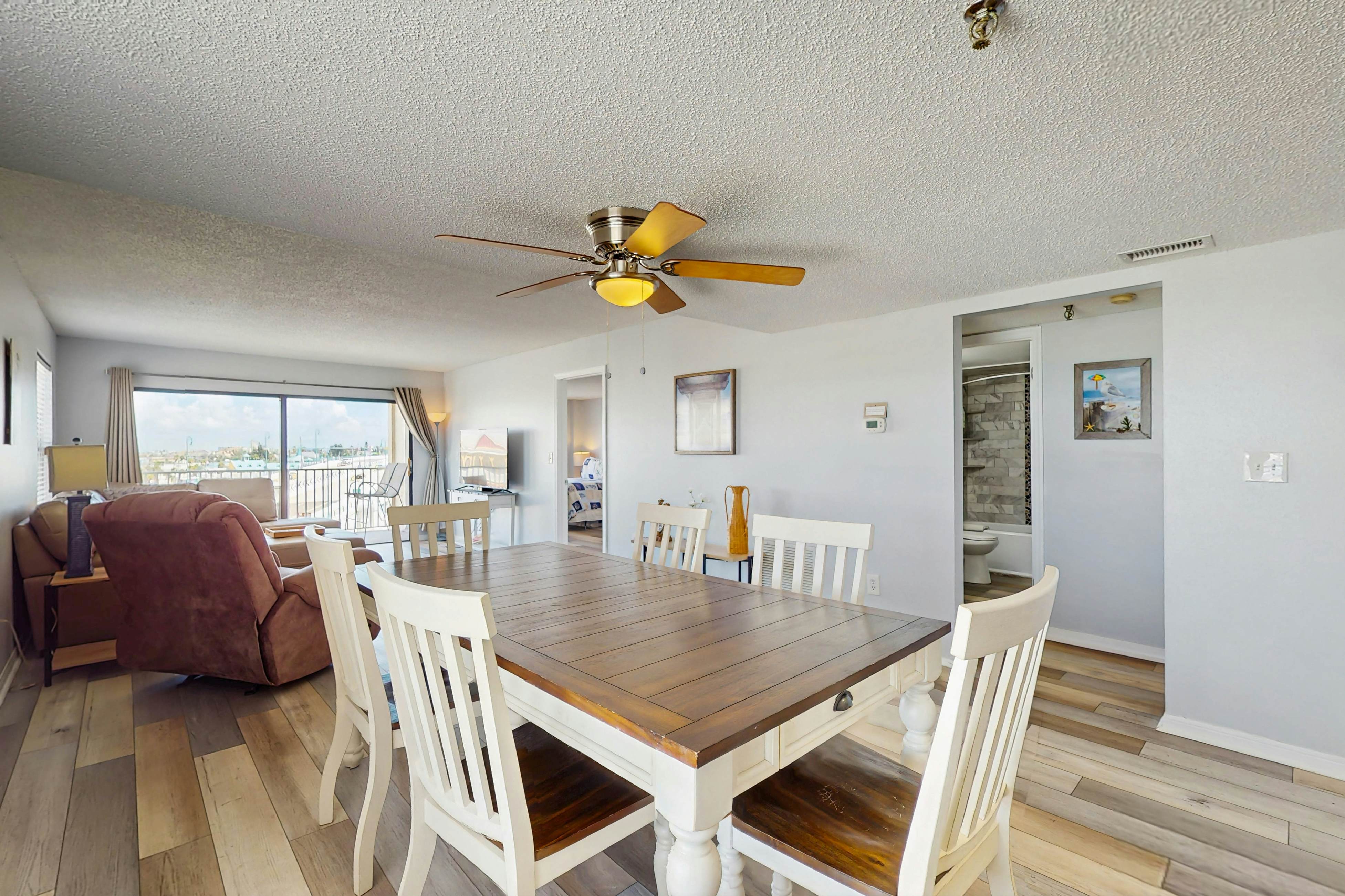 Newly renovated condo w/private balcony, gas grill, & on-site heated pool, AC