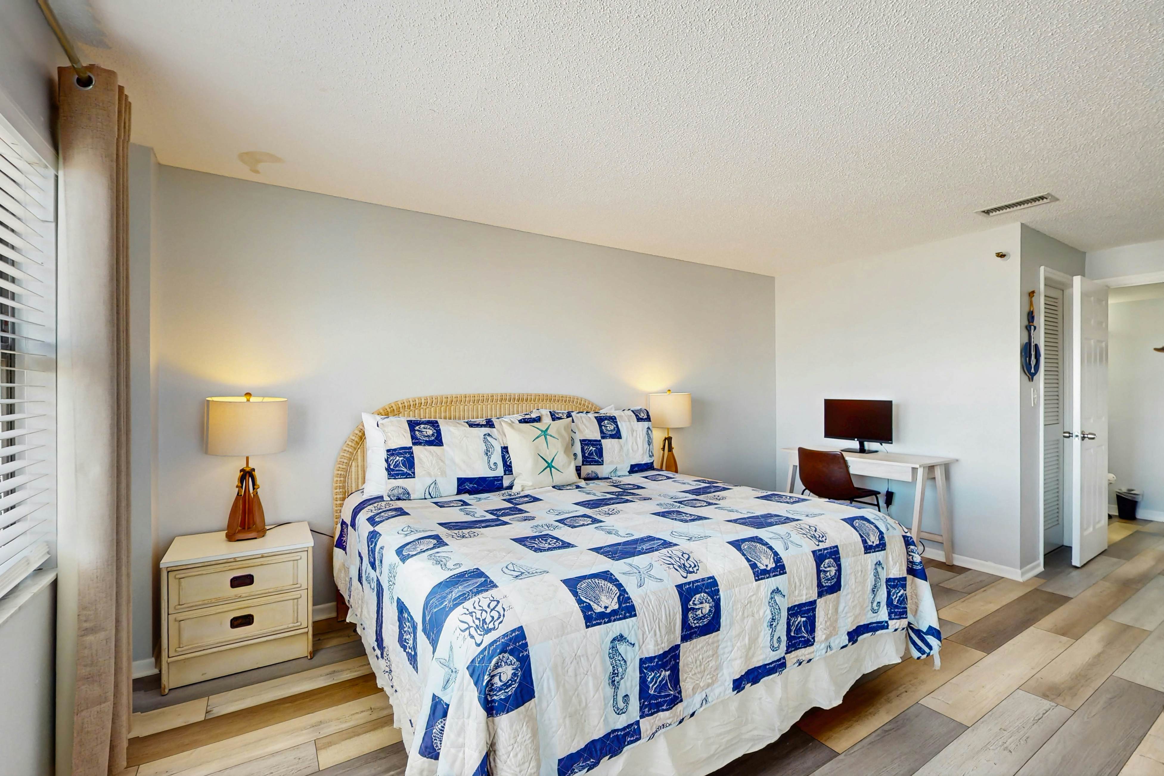 Newly renovated condo w/private balcony, gas grill, & on-site heated pool, AC