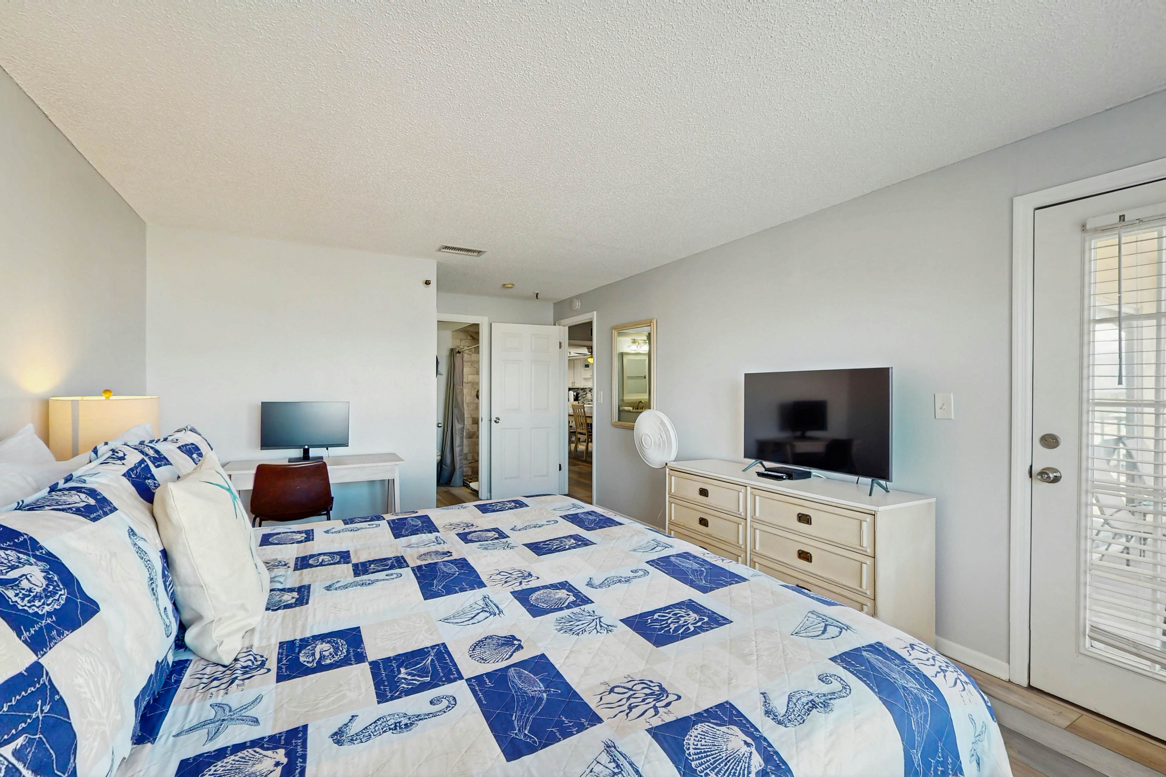 Newly renovated condo w/private balcony, gas grill, & on-site heated pool, AC