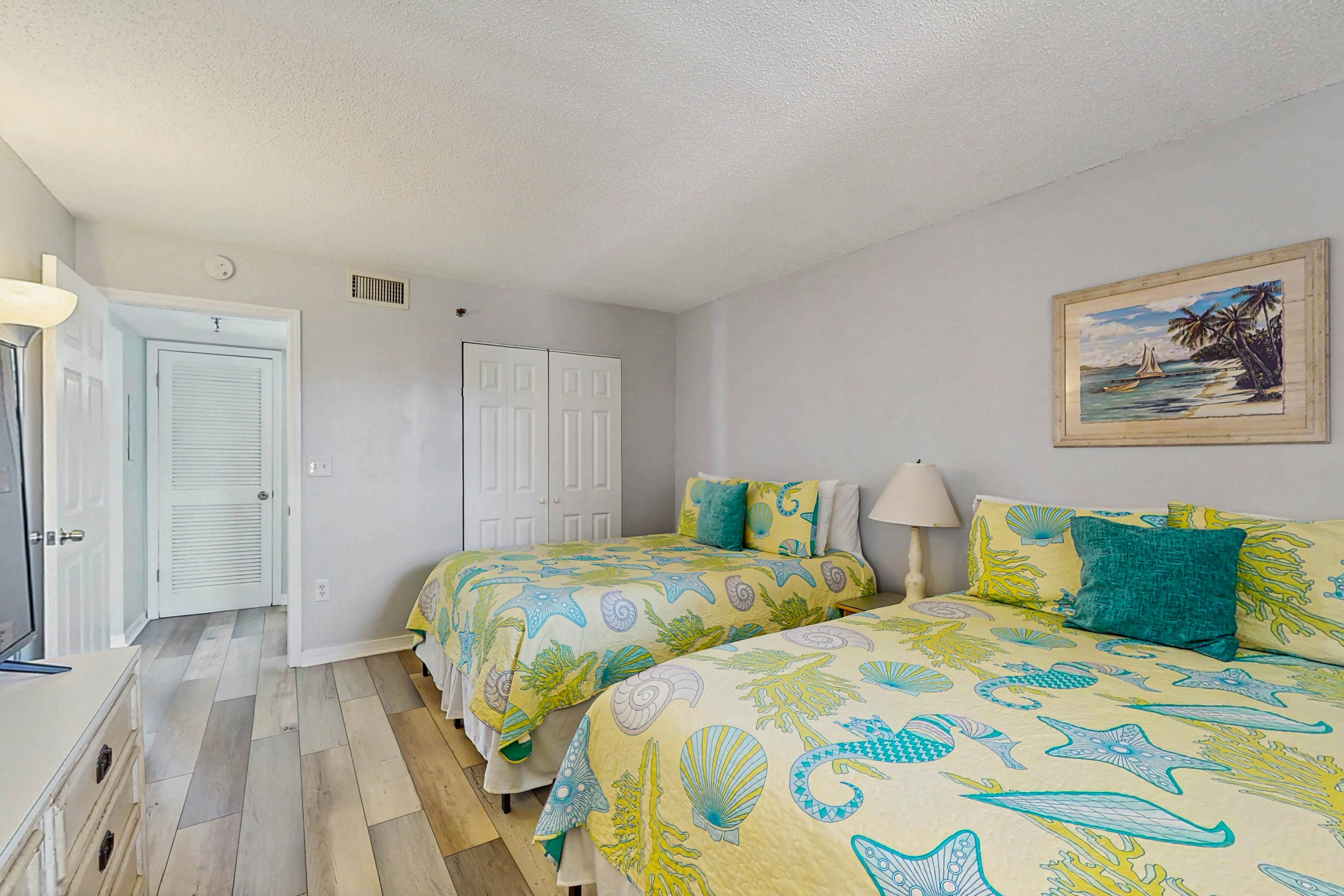 Newly renovated condo w/private balcony, gas grill, & on-site heated pool, AC