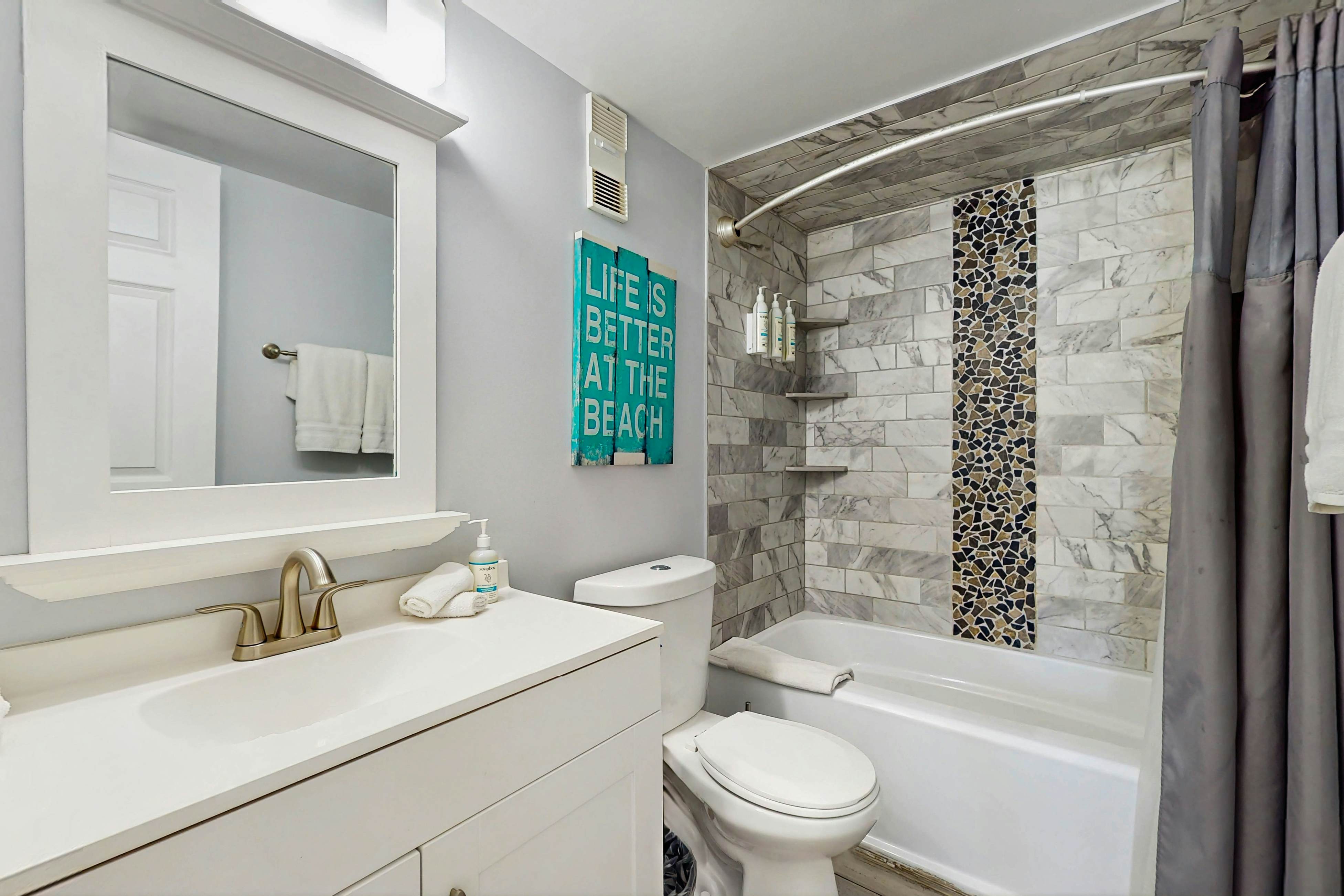 Newly renovated condo w/private balcony, gas grill, & on-site heated pool, AC