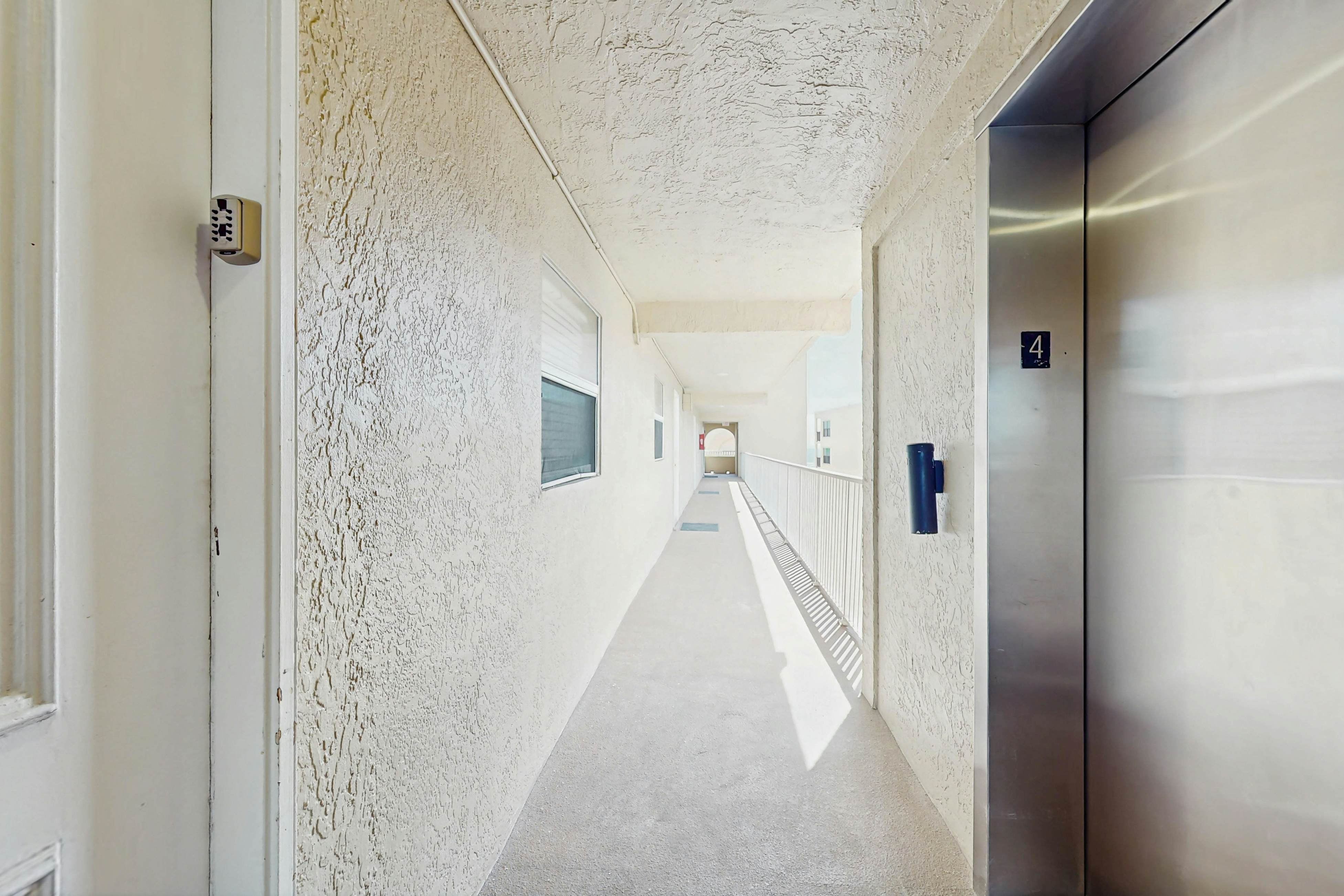 Newly renovated condo w/private balcony, gas grill, & on-site heated pool, AC