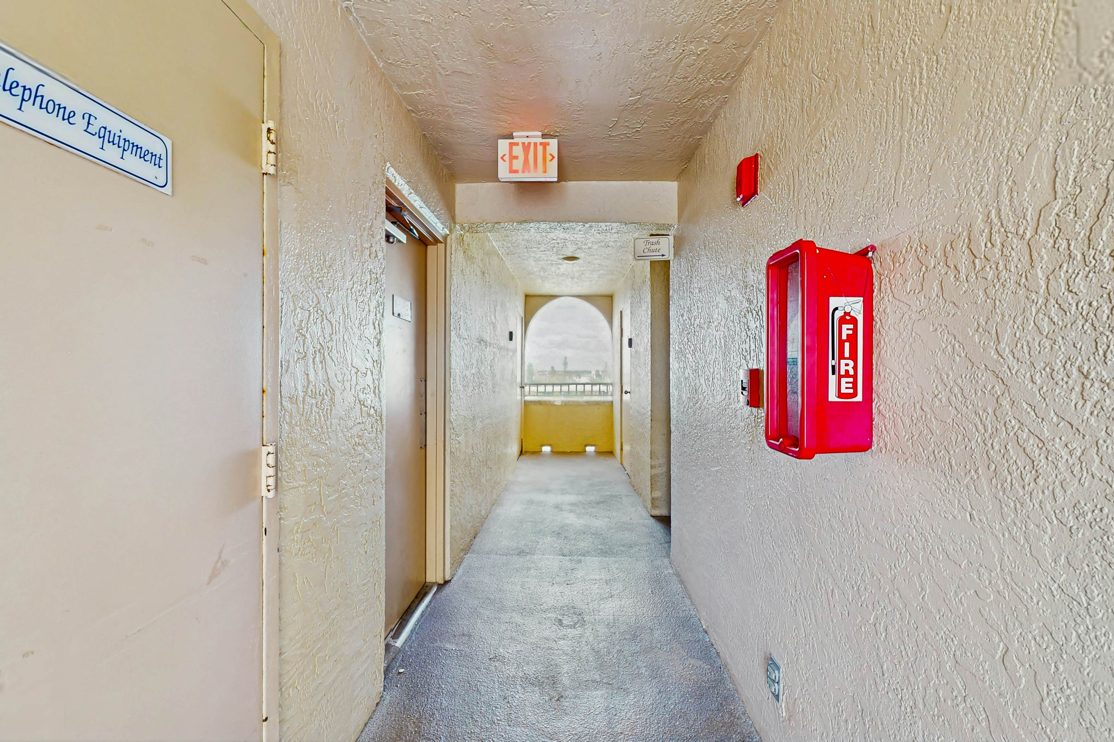 Newly renovated condo w/private balcony, gas grill, & on-site heated pool, AC