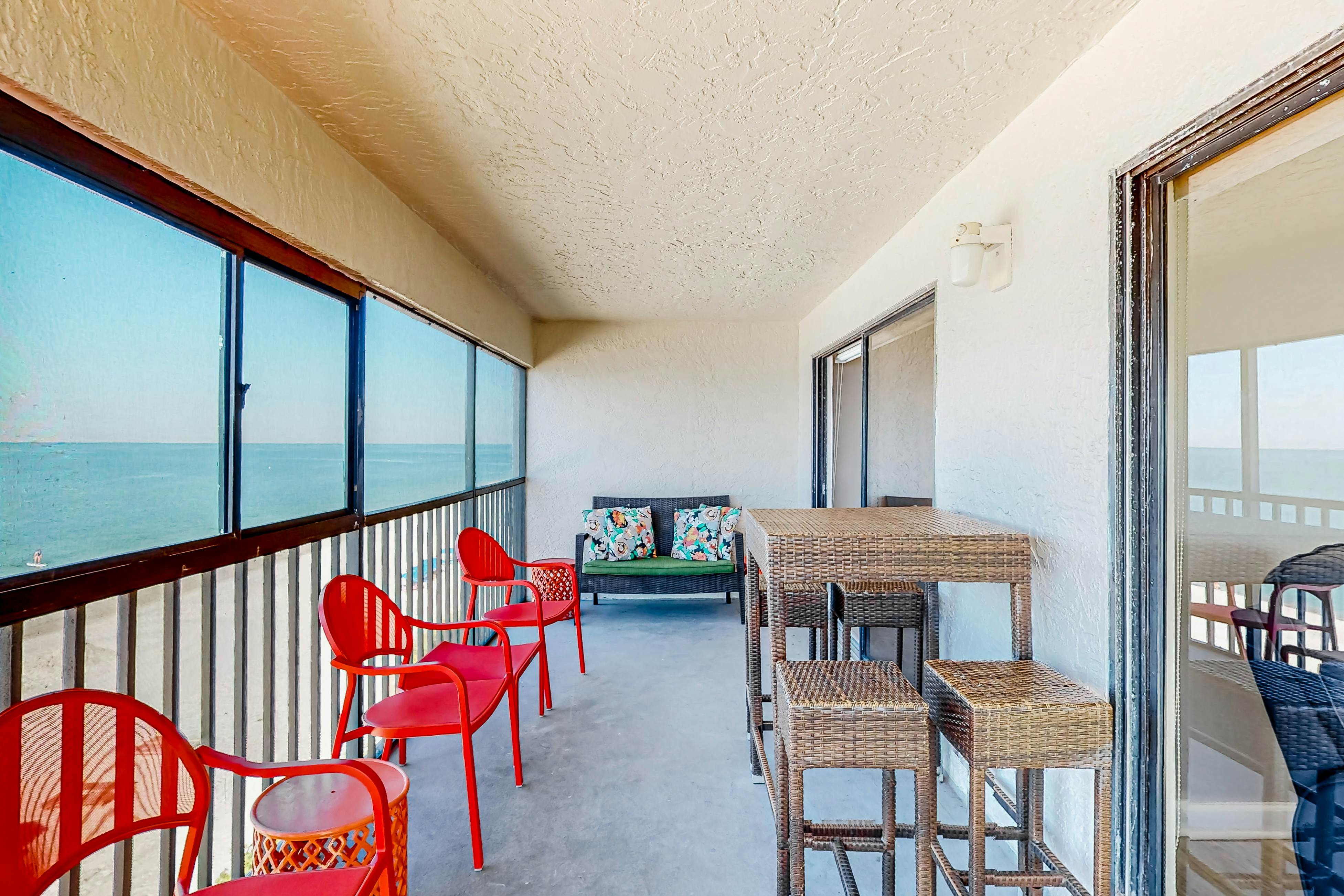 Renovated beachfront condo with pool, amazing Gulf views & washer/dryer