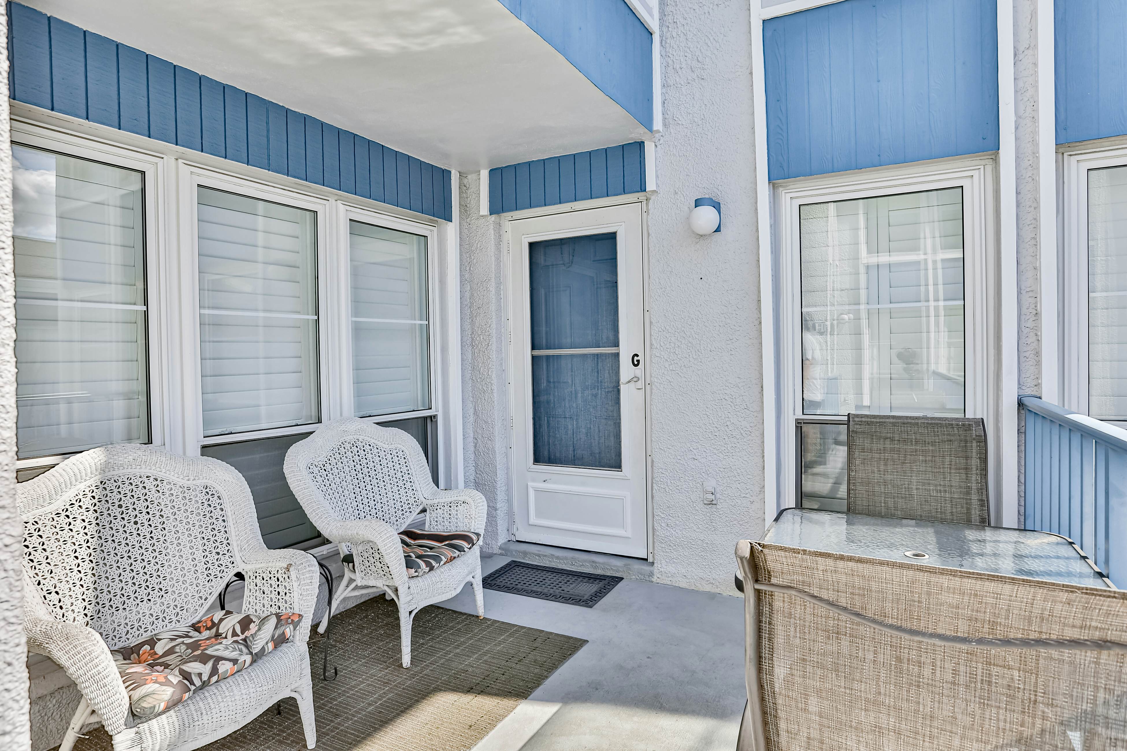 Water-view condo with balcony, pool & W/D - walk to beach