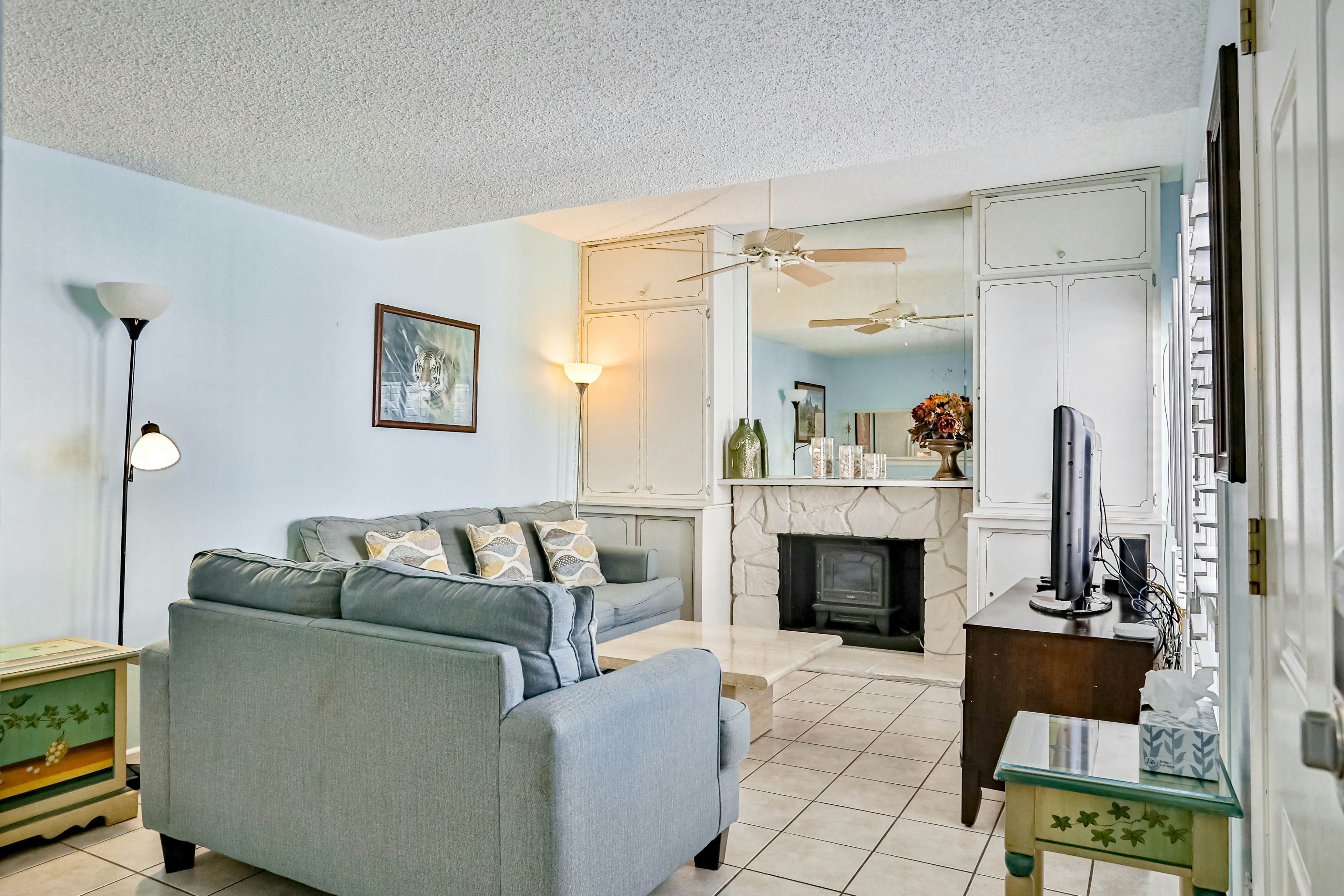 Water-view condo with balcony, pool & W/D - walk to beach