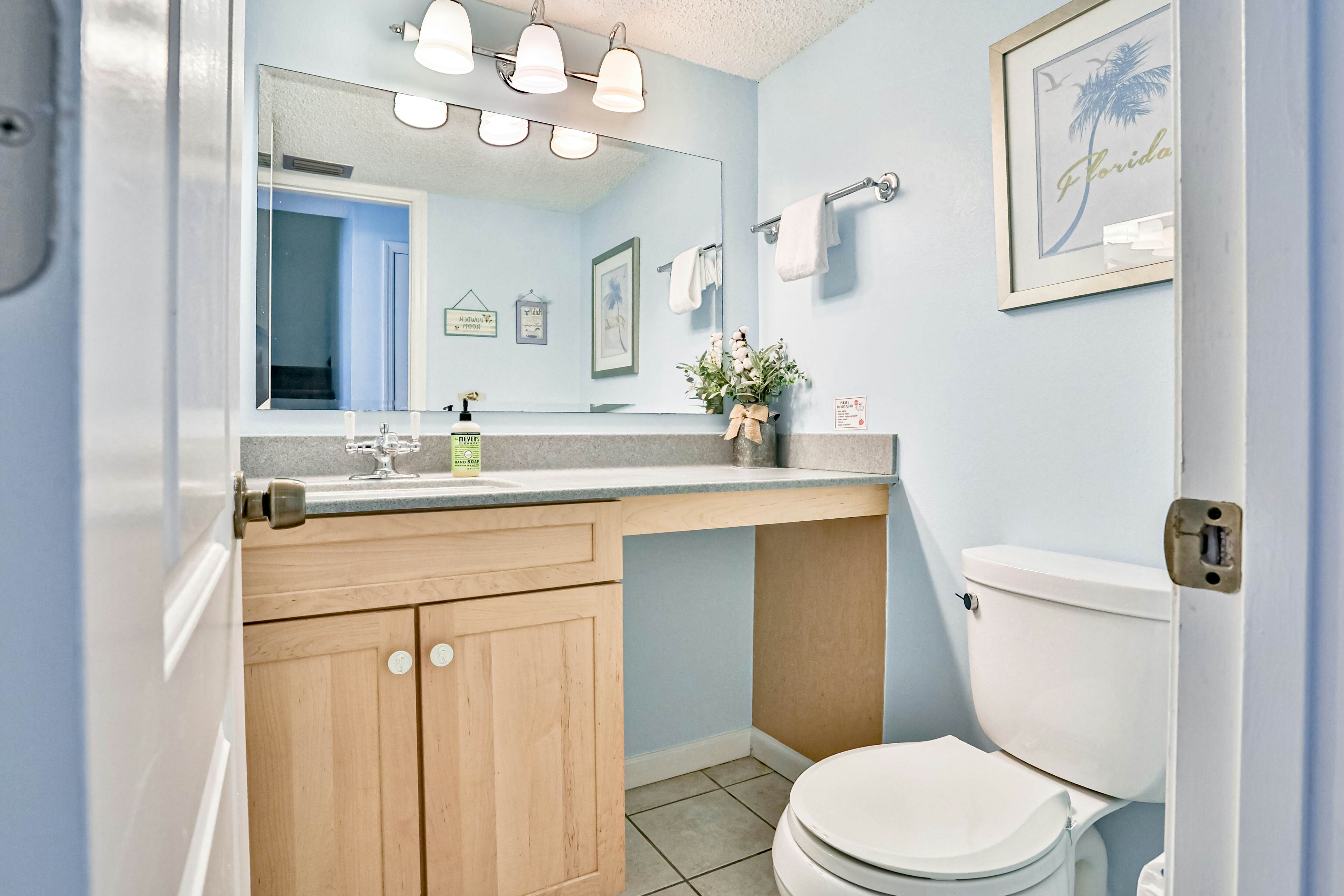 Water-view condo with balcony, pool & W/D - walk to beach