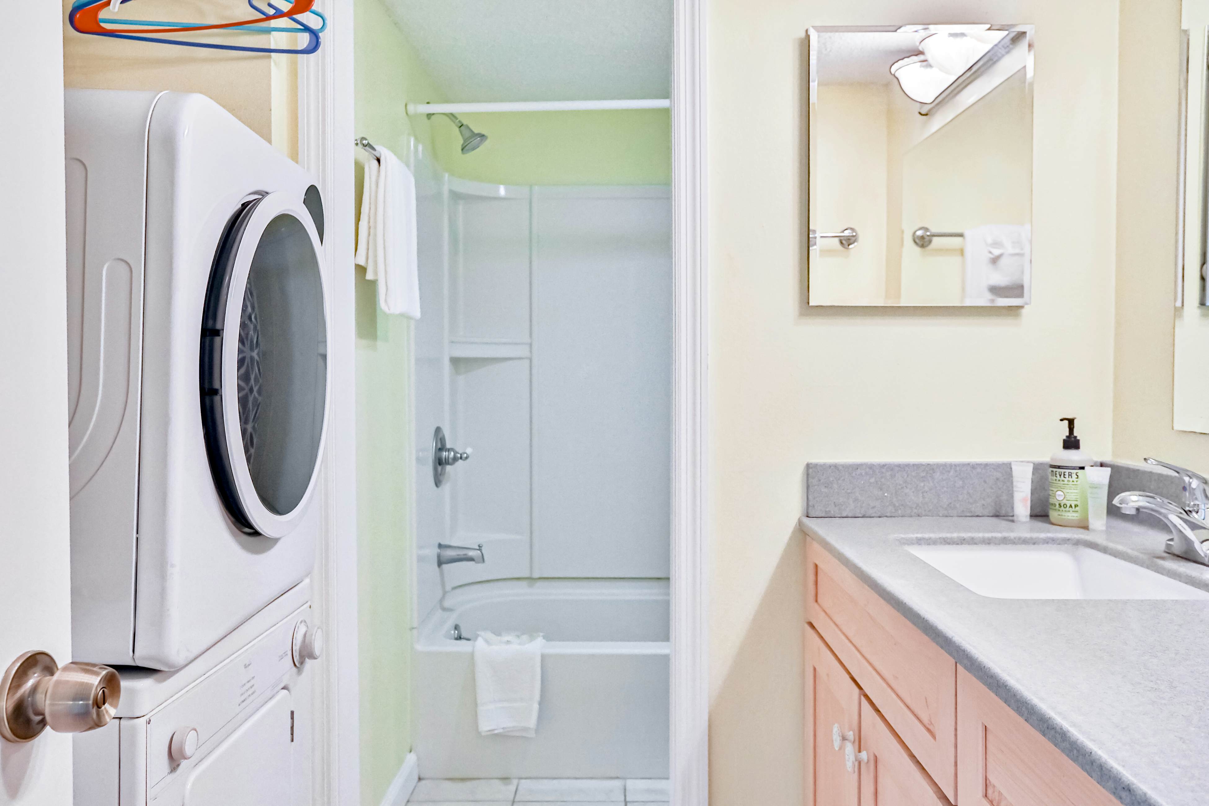 Water-view condo with balcony, pool & W/D - walk to beach