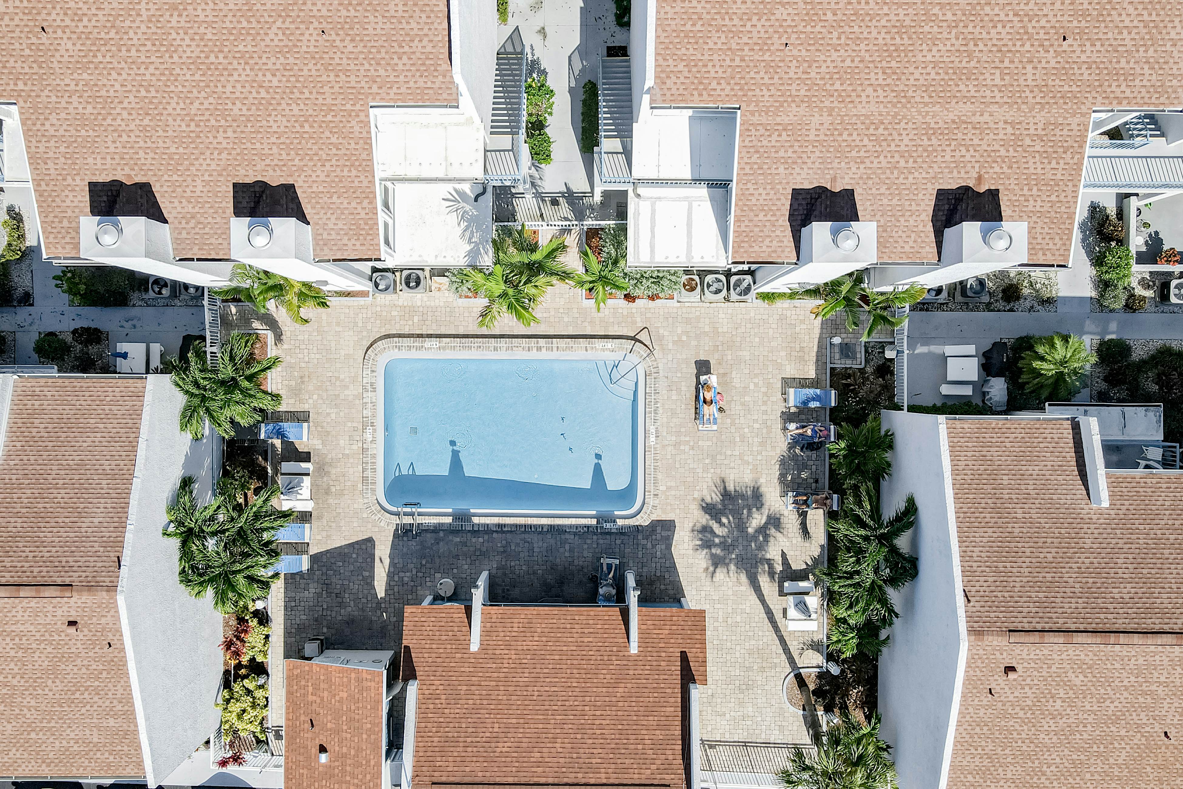 Water-view condo with balcony, pool & W/D - walk to beach