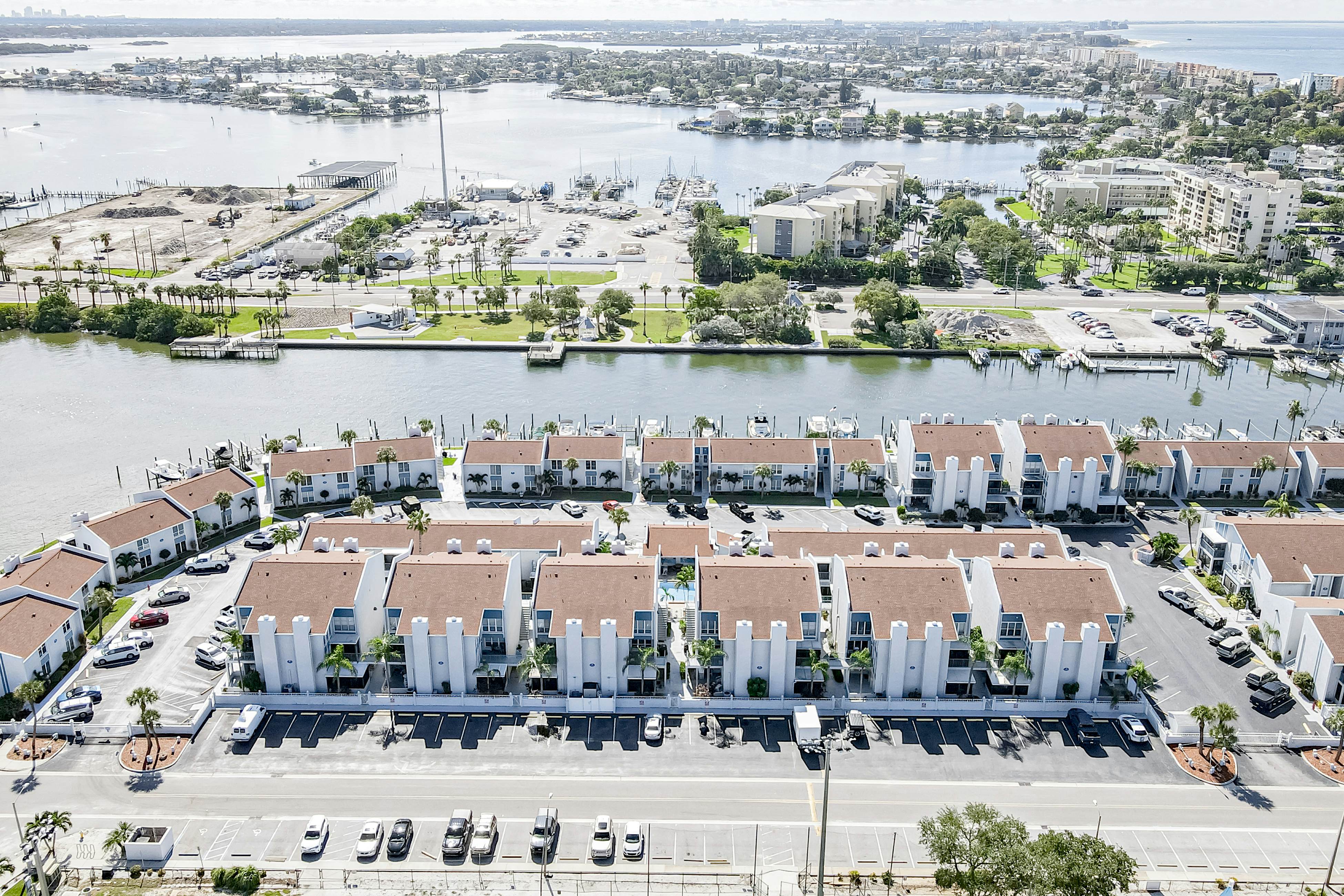 Water-view condo with balcony, pool & W/D - walk to beach