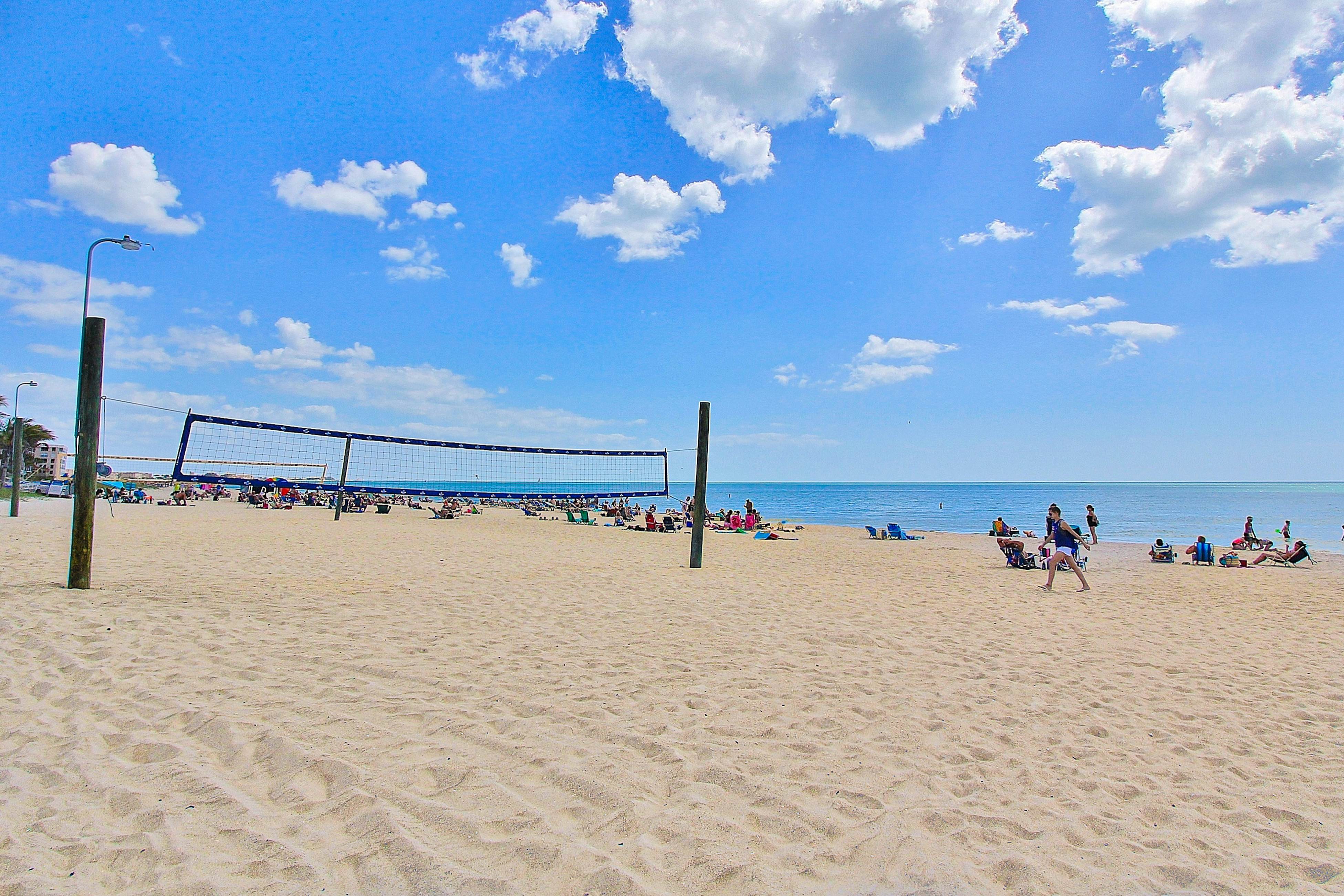 Water-view condo with balcony, pool & W/D - walk to beach