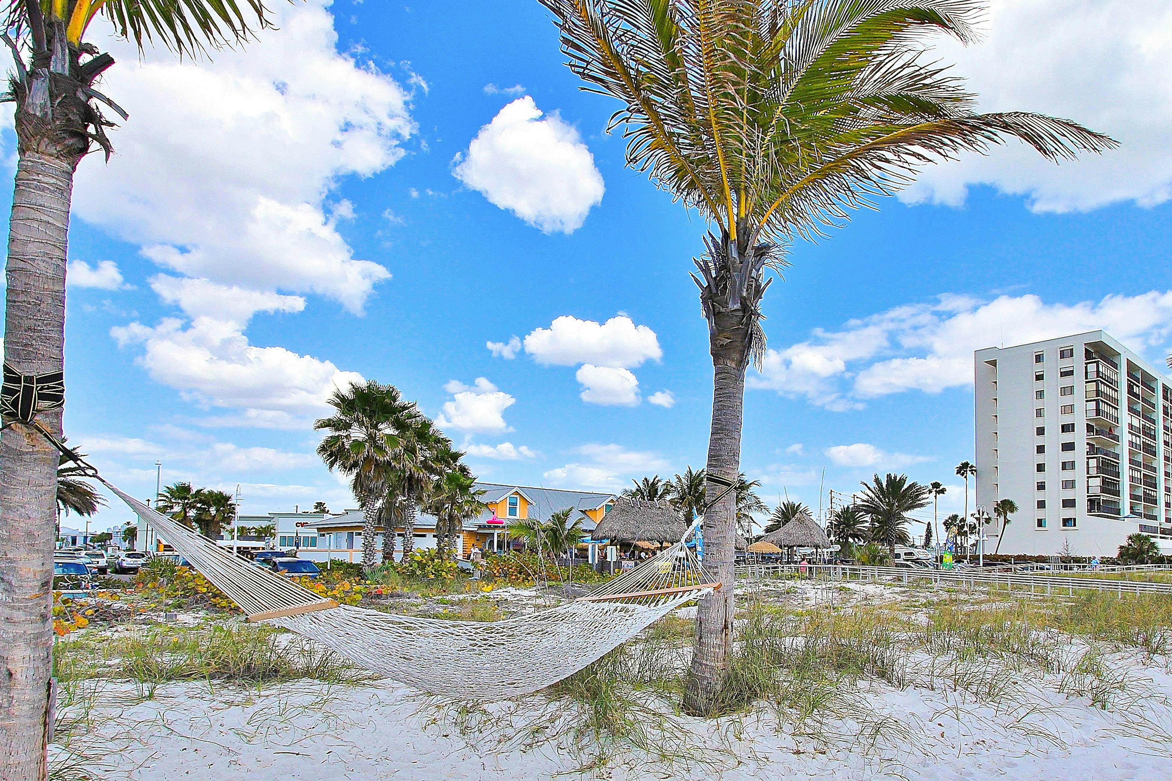 Water-view condo with balcony, pool & W/D - walk to beach