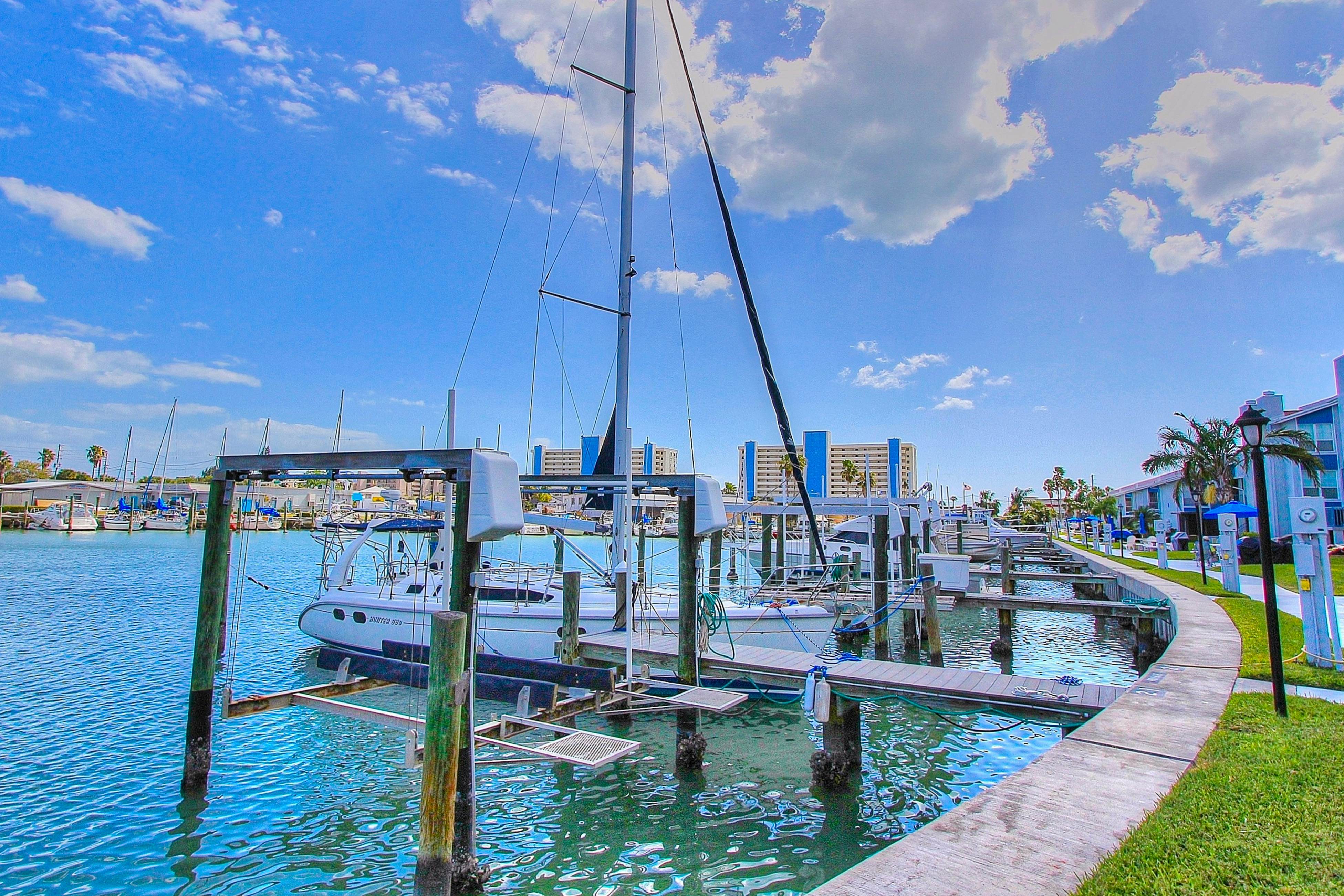 Water-view condo with balcony, pool & W/D - walk to beach