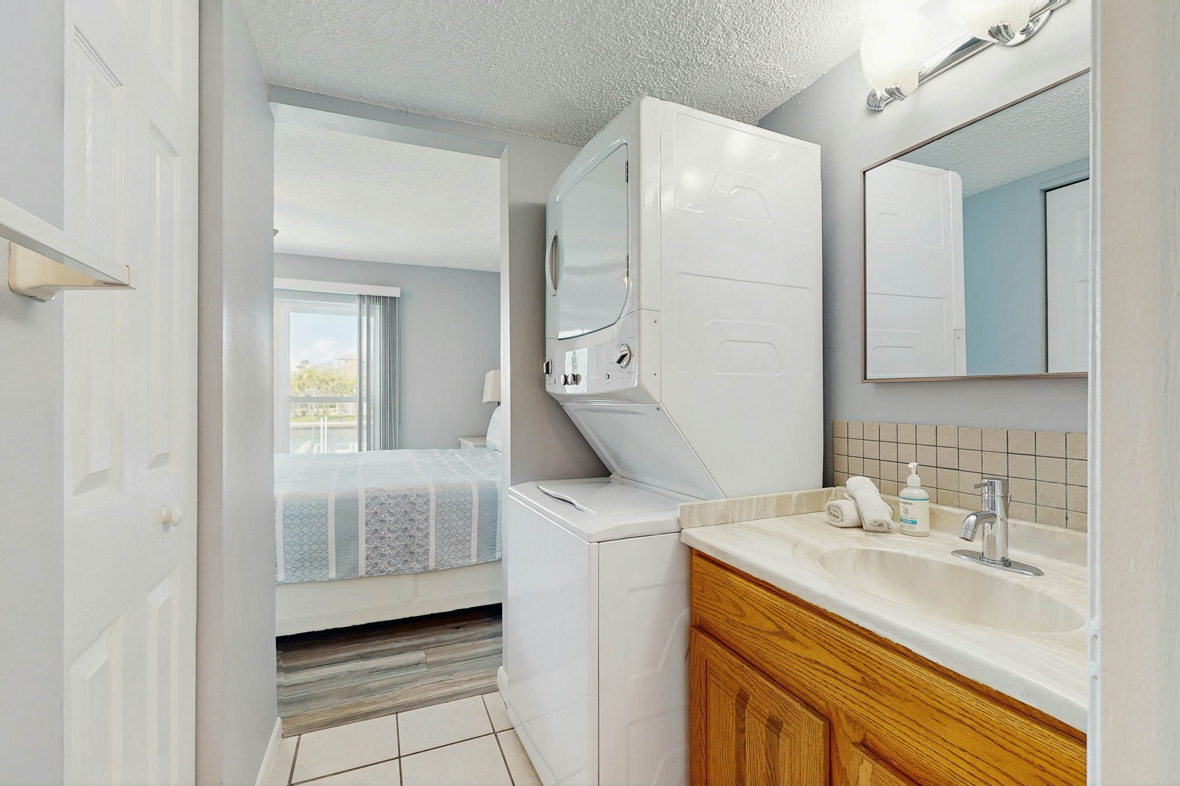 Waterfront wonder with Intracoastal views, heated pool, hot tub & fishing dock