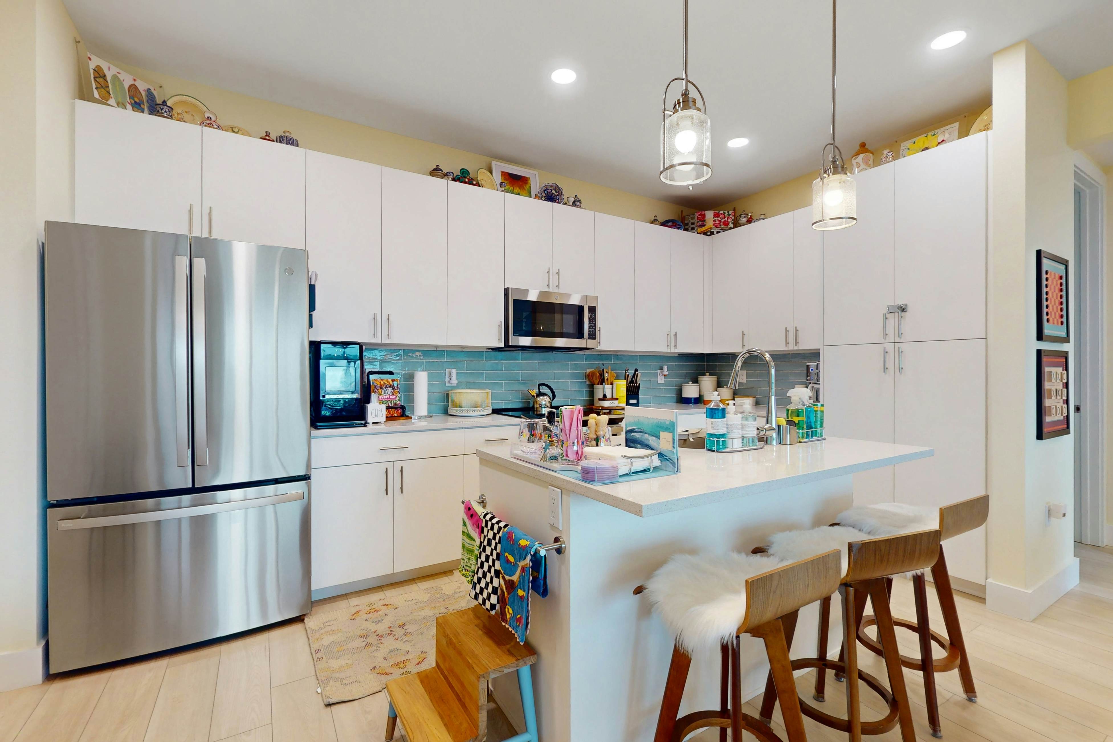 Sunlit & colorful beach condo with pool, hot tub, & balcony - near shore & shops