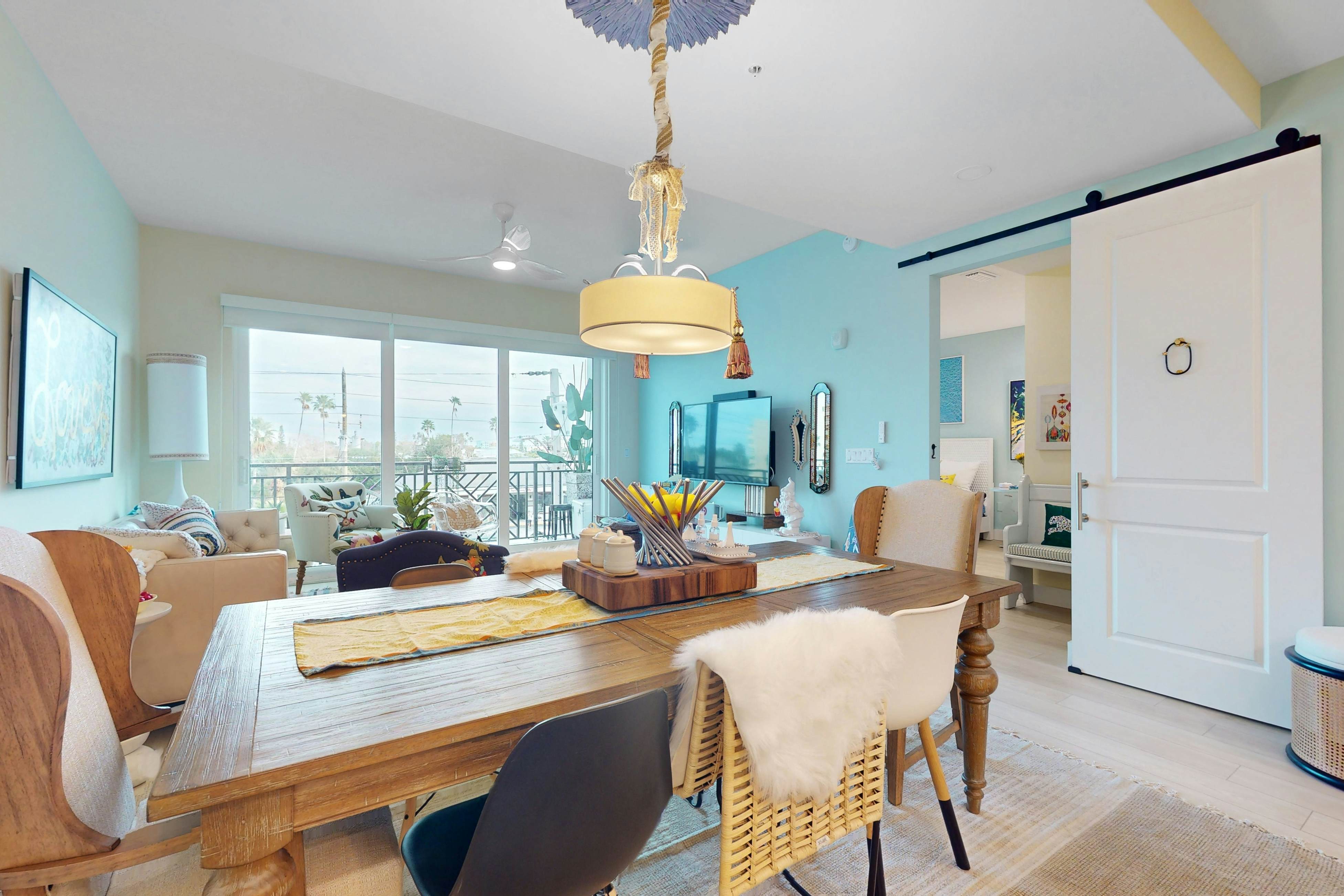 Sunlit & colorful beach condo with pool, hot tub, & balcony - near shore & shops