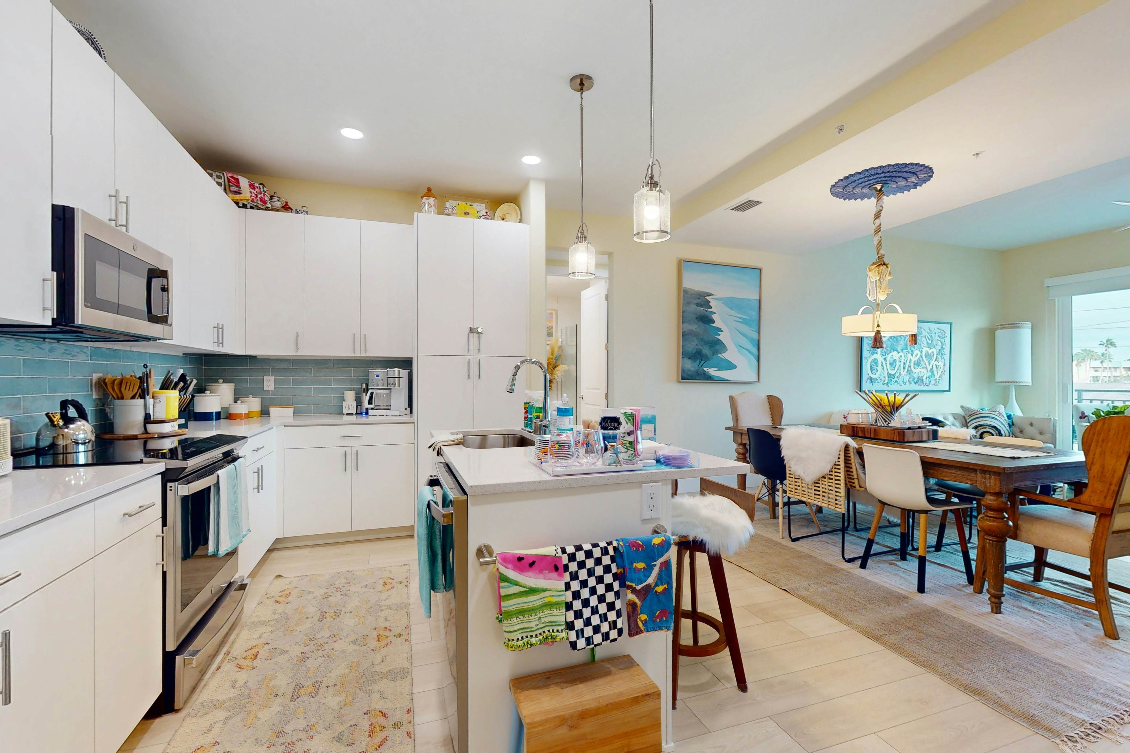 Sunlit & colorful beach condo with pool, hot tub, & balcony - near shore & shops