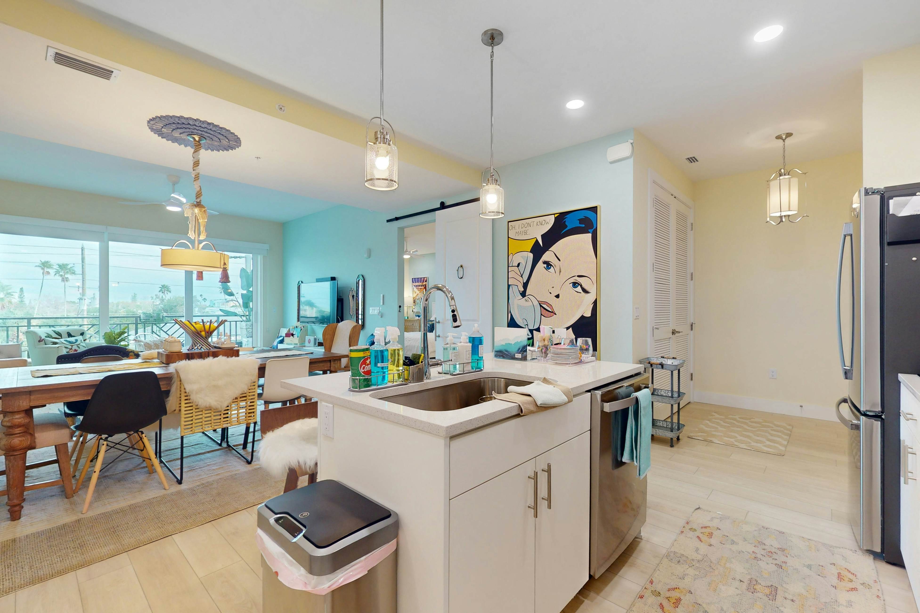 Sunlit & colorful beach condo with pool, hot tub, & balcony - near shore & shops