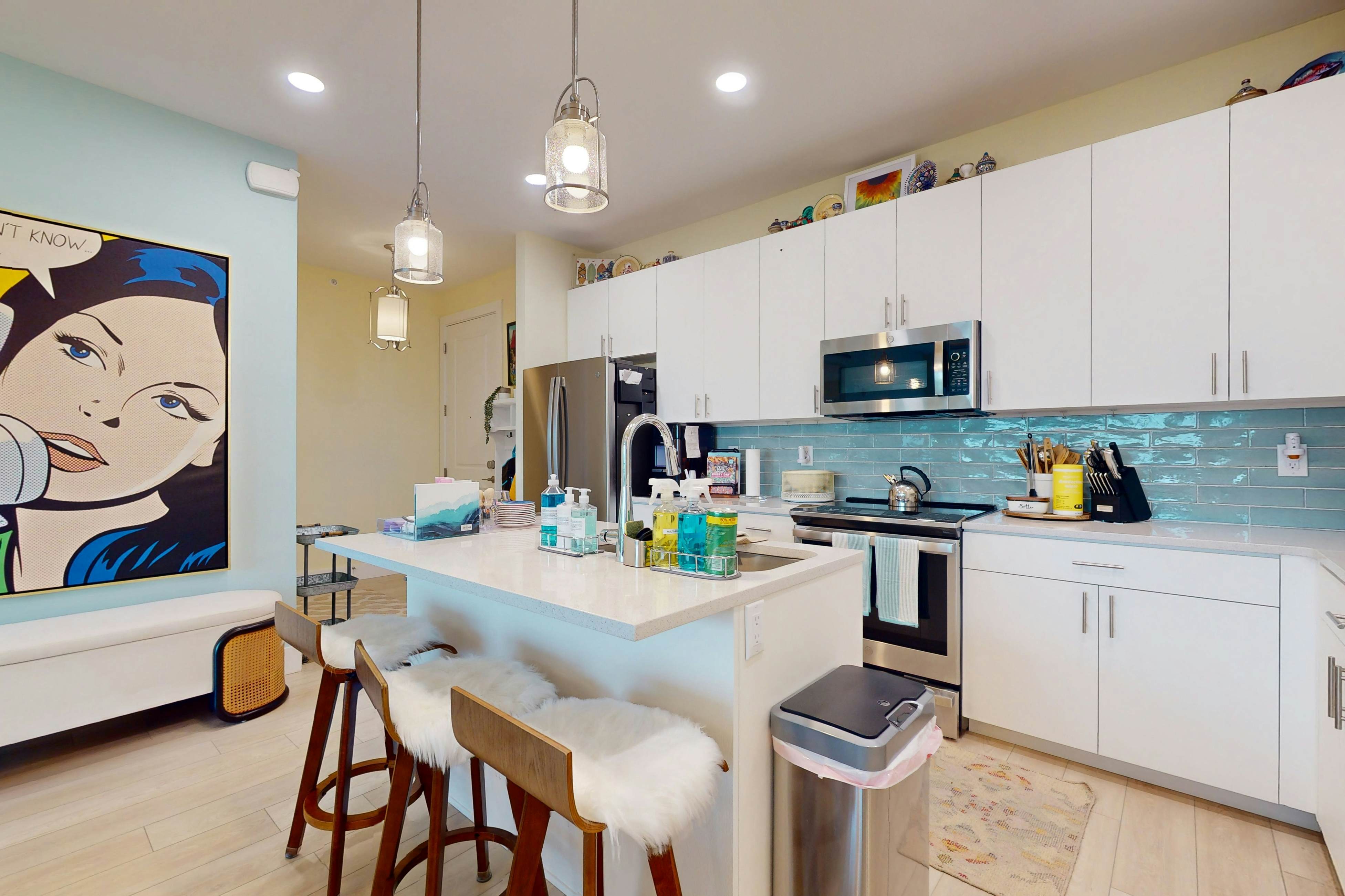 Sunlit & colorful beach condo with pool, hot tub, & balcony - near shore & shops