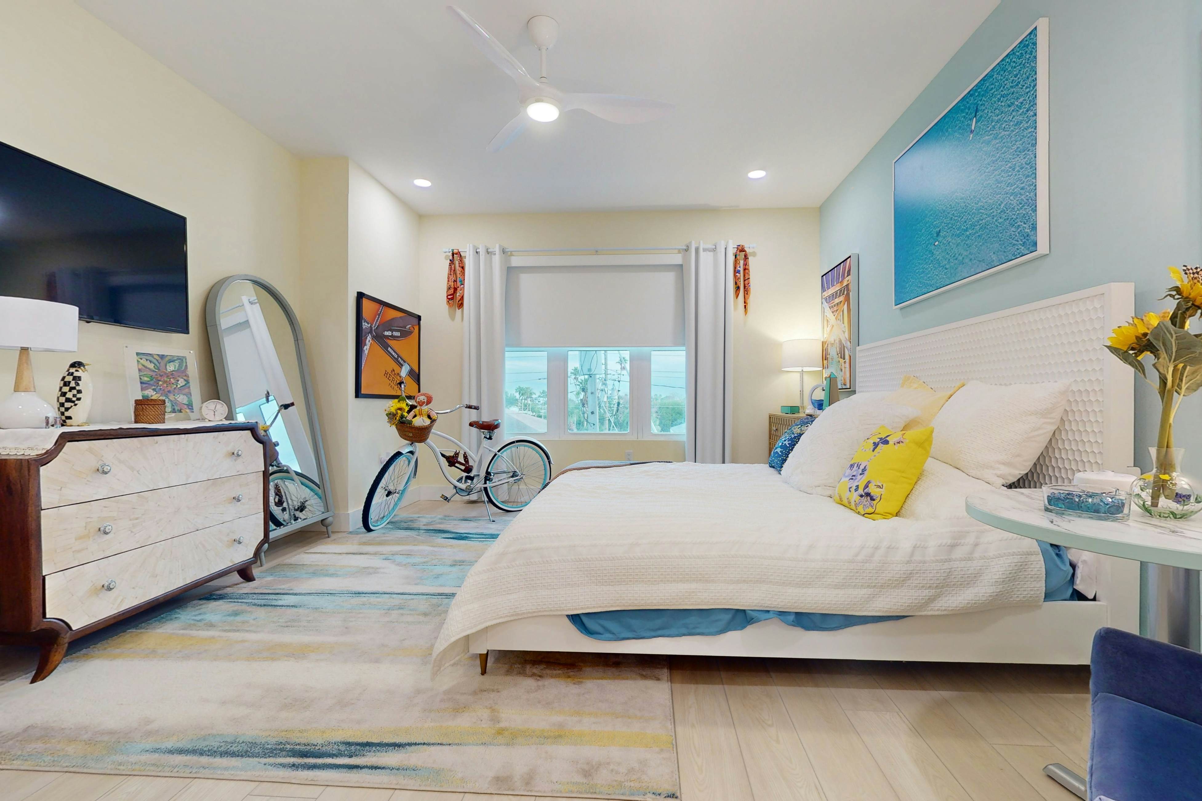 Sunlit & colorful beach condo with pool, hot tub, & balcony - near shore & shops