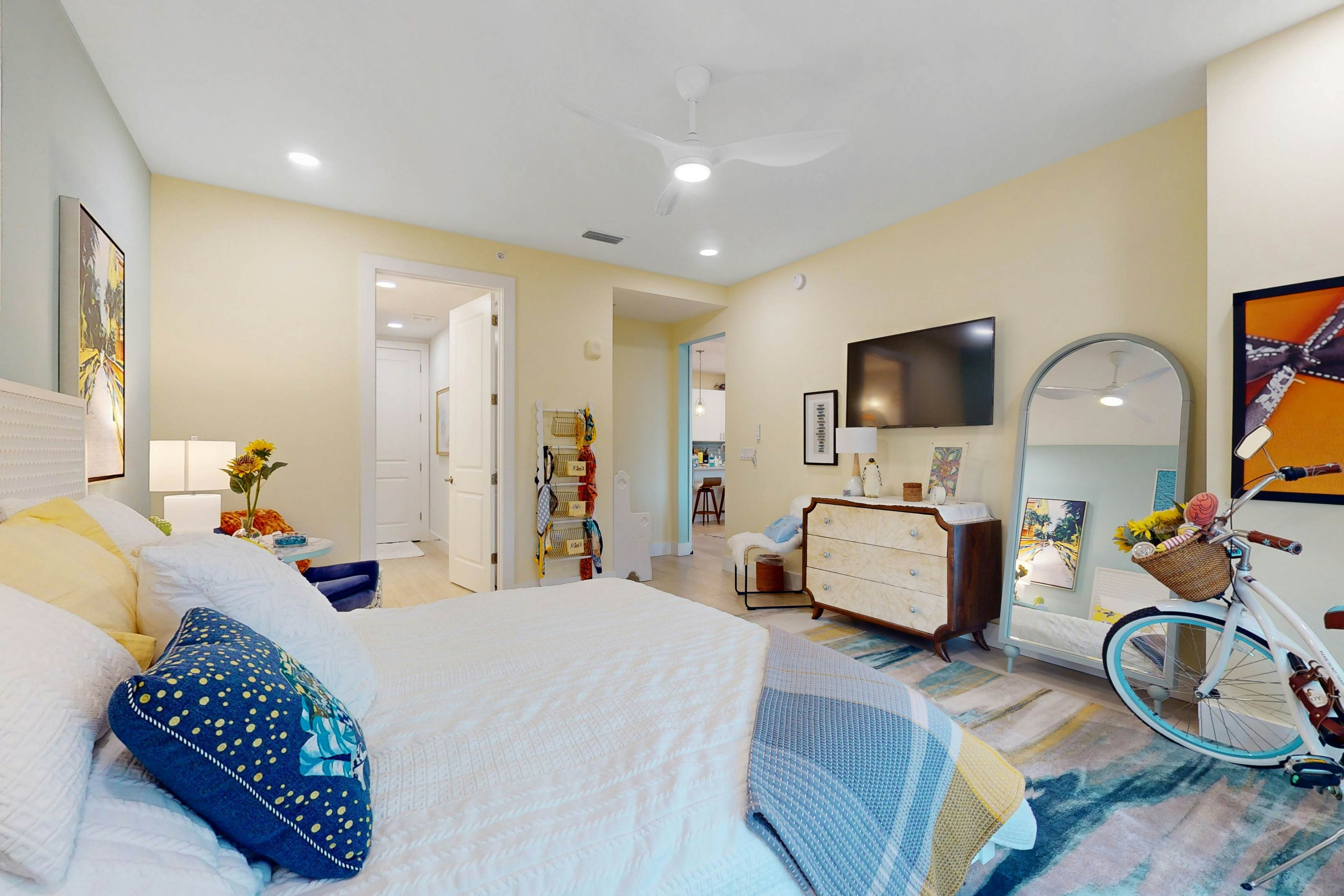 Sunlit & colorful beach condo with pool, hot tub, & balcony - near shore & shops