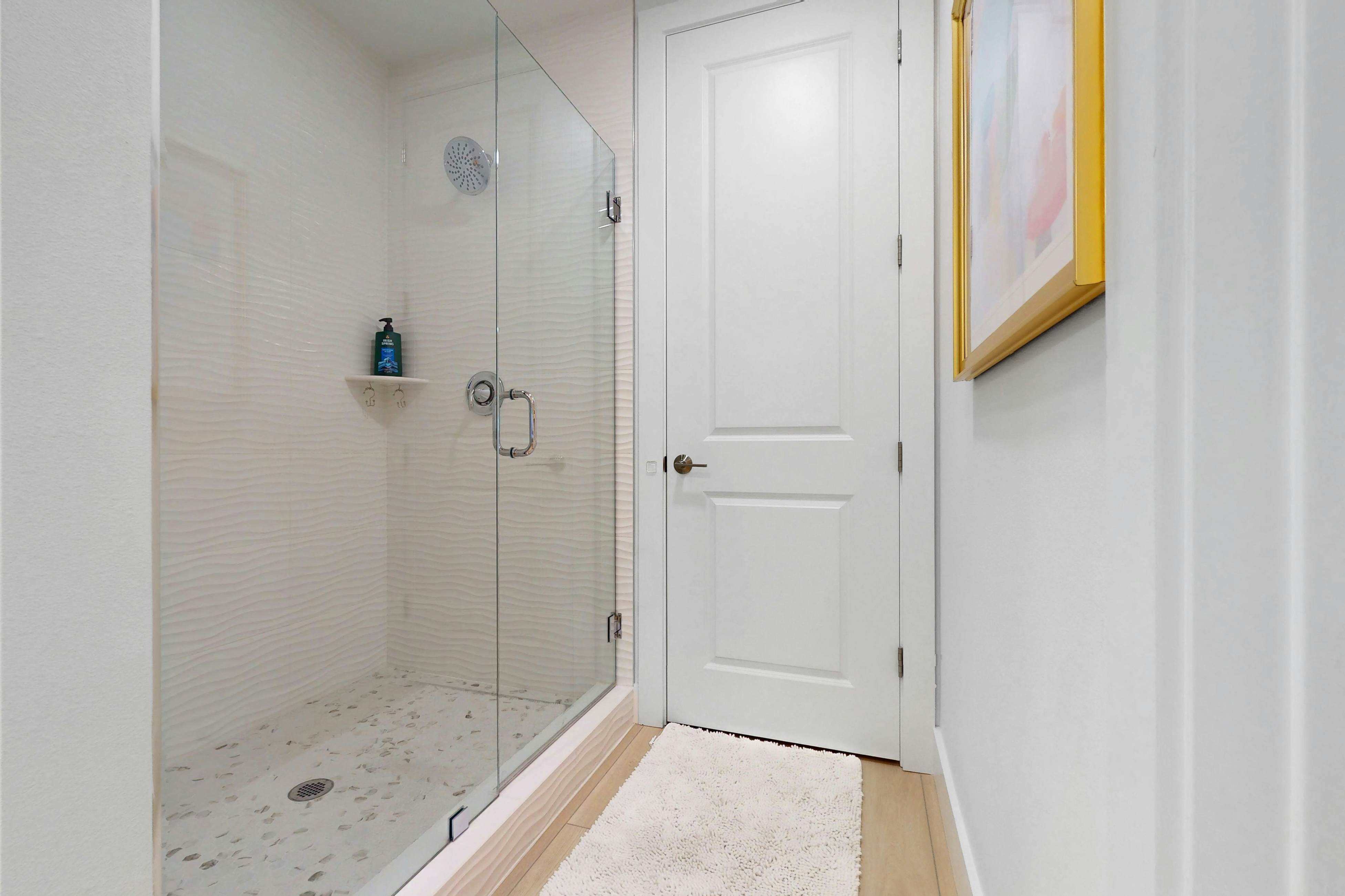 Sunlit & colorful beach condo with pool, hot tub, & balcony - near shore & shops