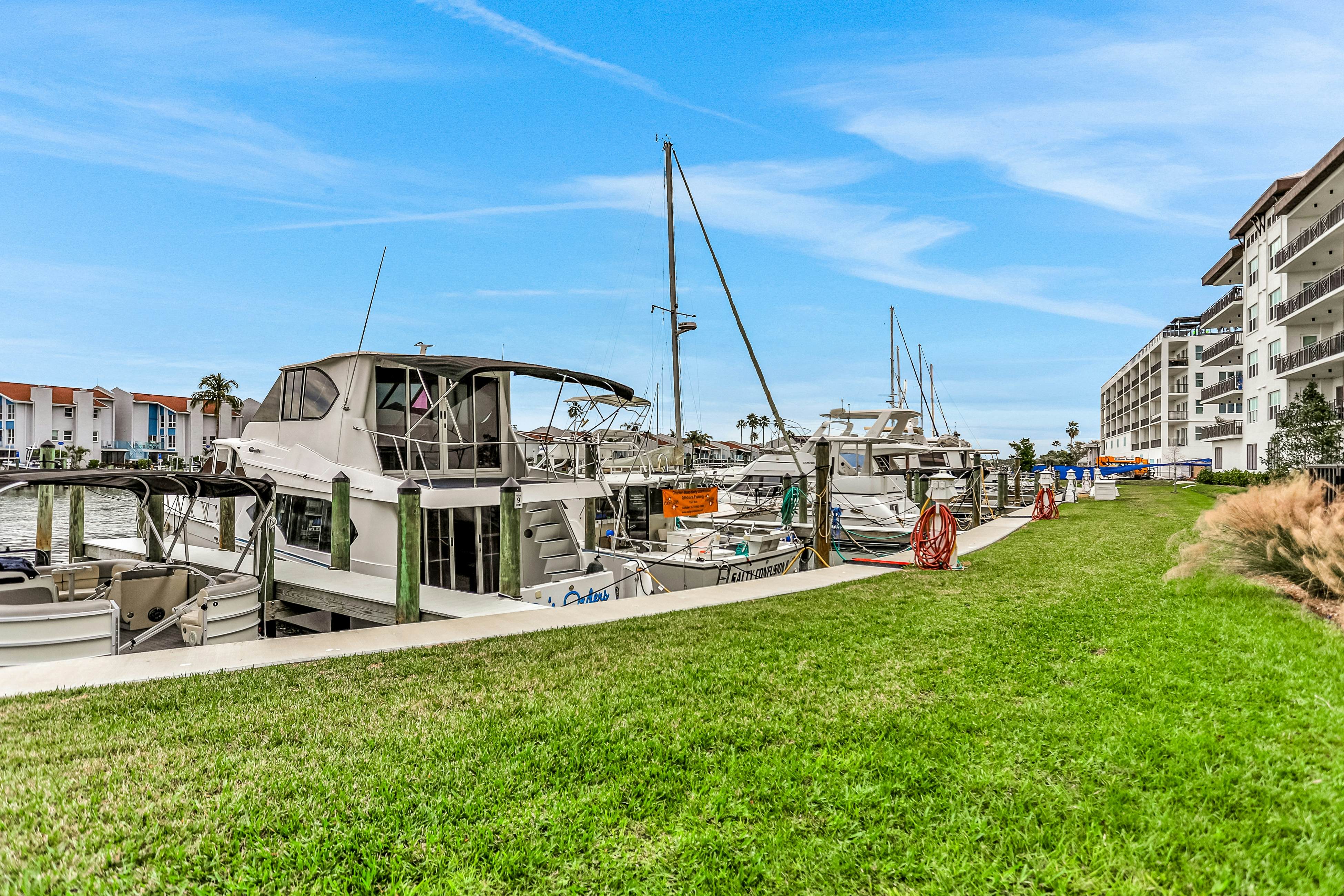 Sunlit & colorful beach condo with pool, hot tub, & balcony - near shore & shops