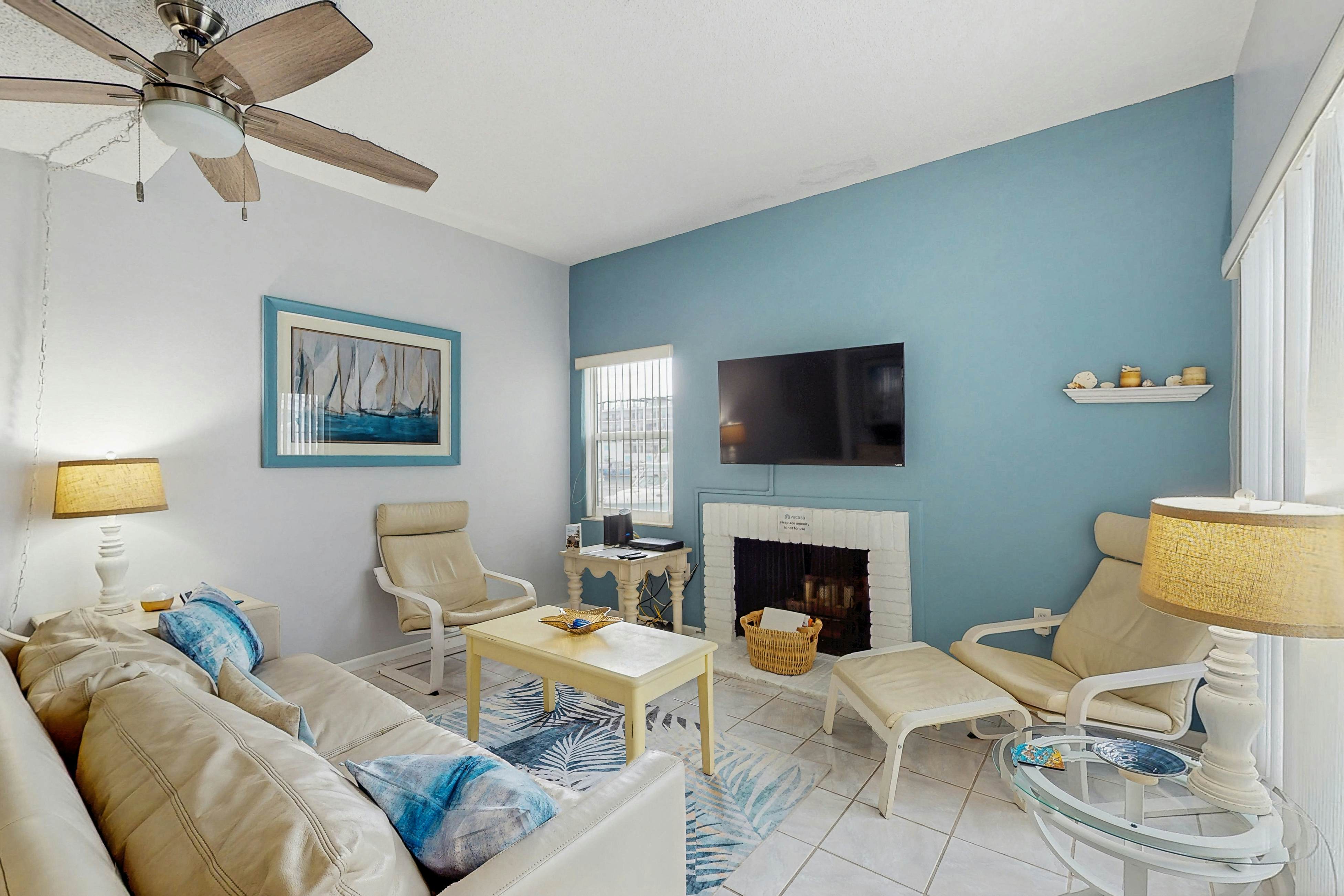 Water-view condo with balcony, grill, heated pool, hot tub, & sauna - walk to beach