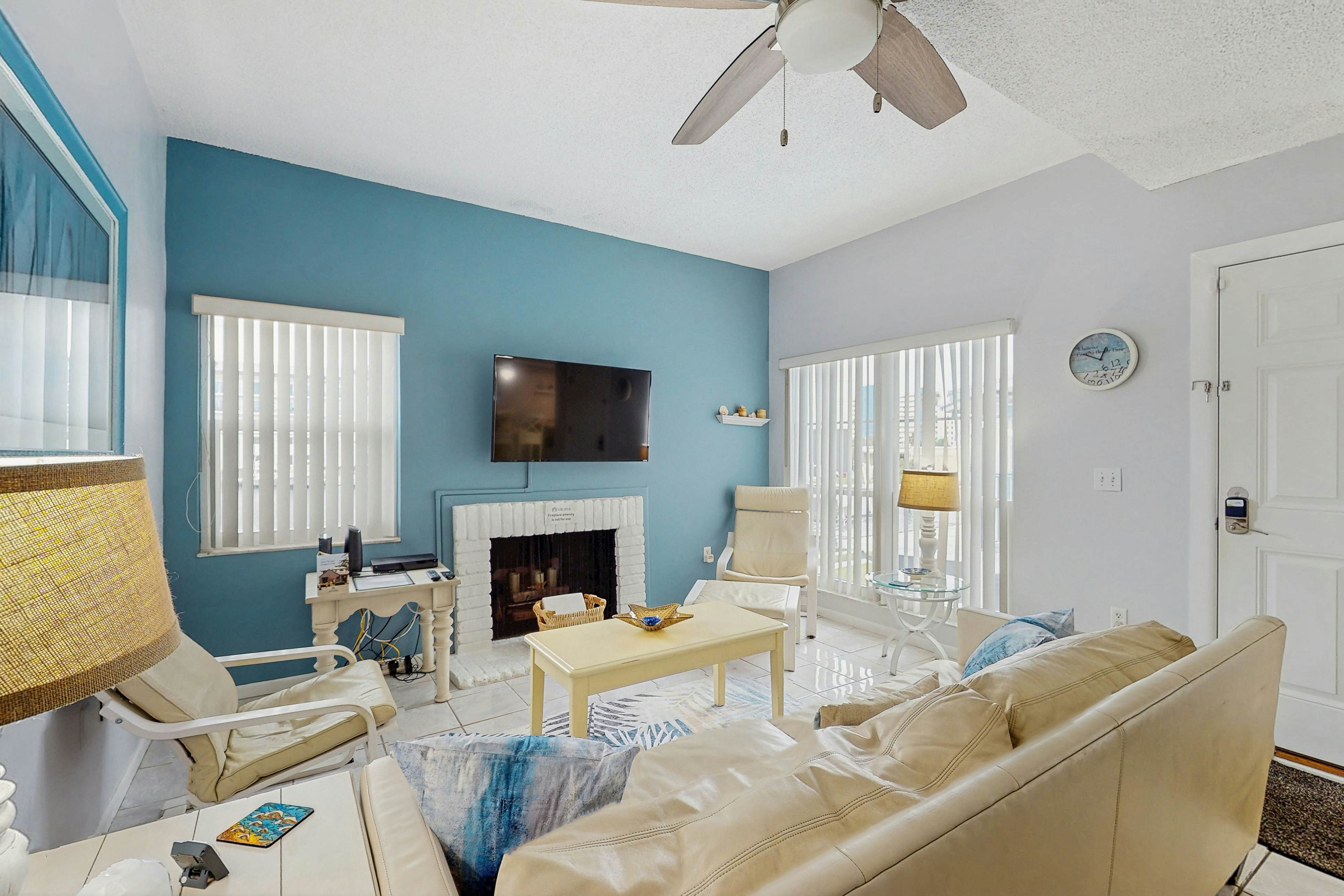 Water-view condo with balcony, grill, heated pool, hot tub, & sauna - walk to beach