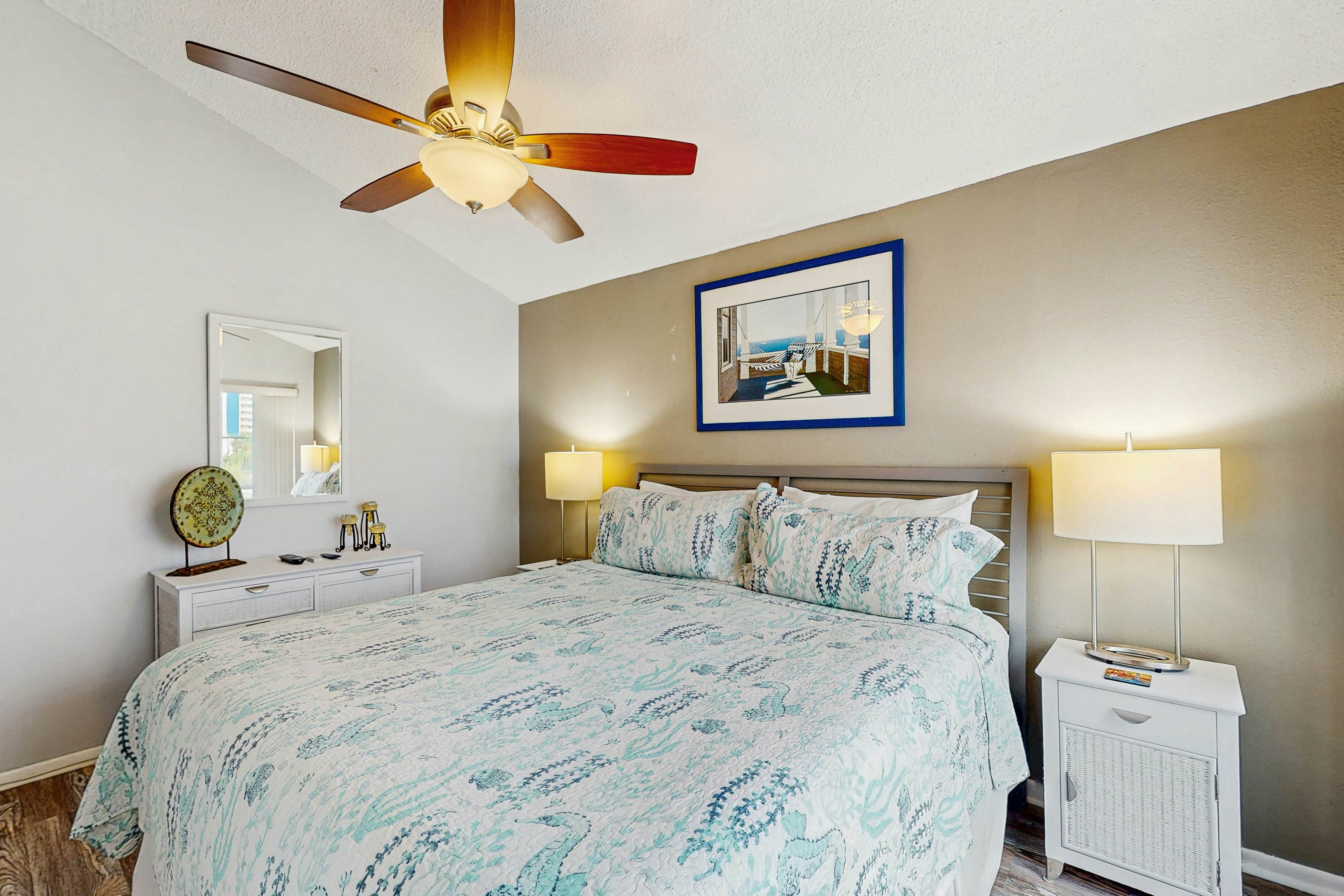 Water-view condo with balcony, grill, heated pool, hot tub, & sauna - walk to beach