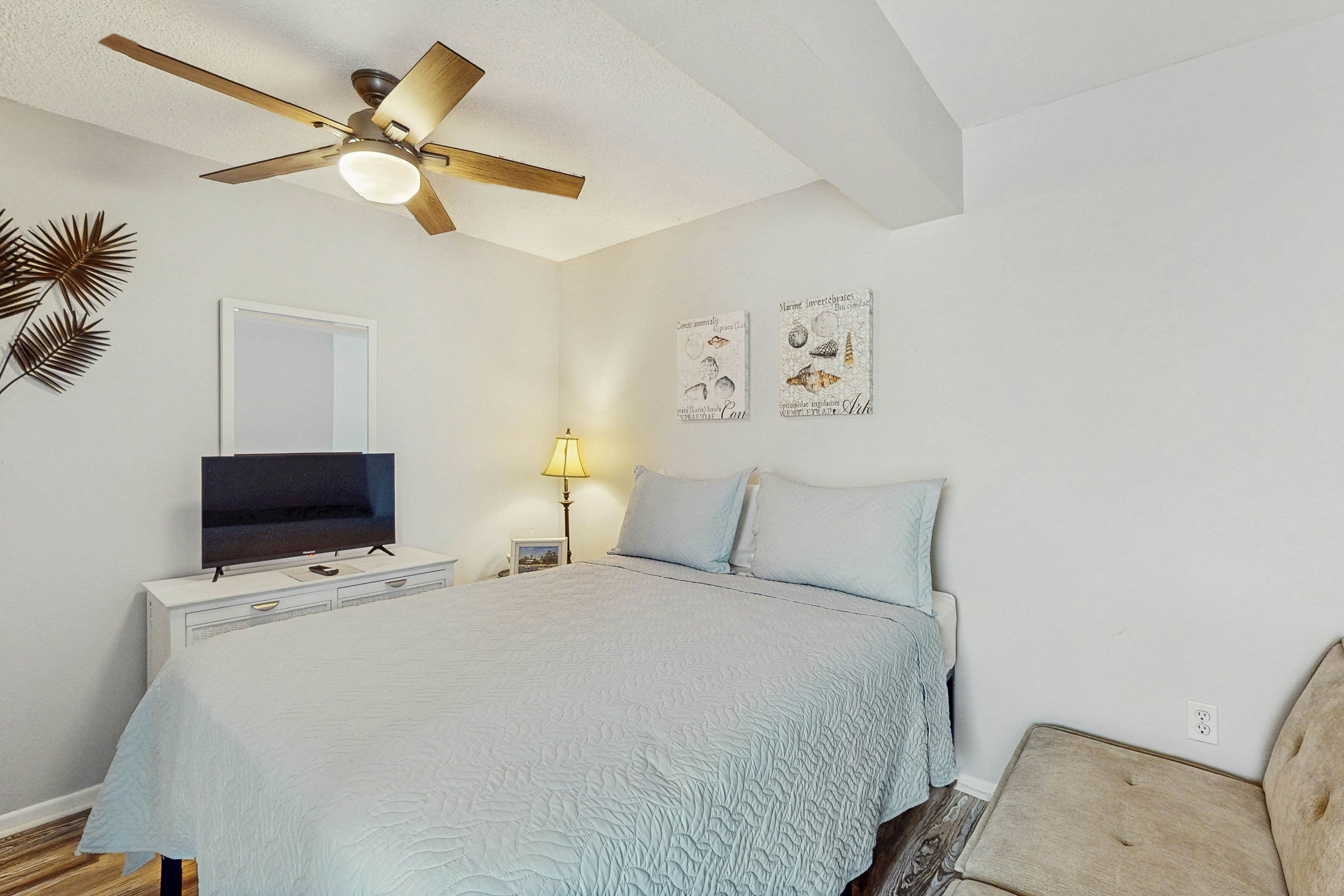 Water-view condo with balcony, grill, heated pool, hot tub, & sauna - walk to beach