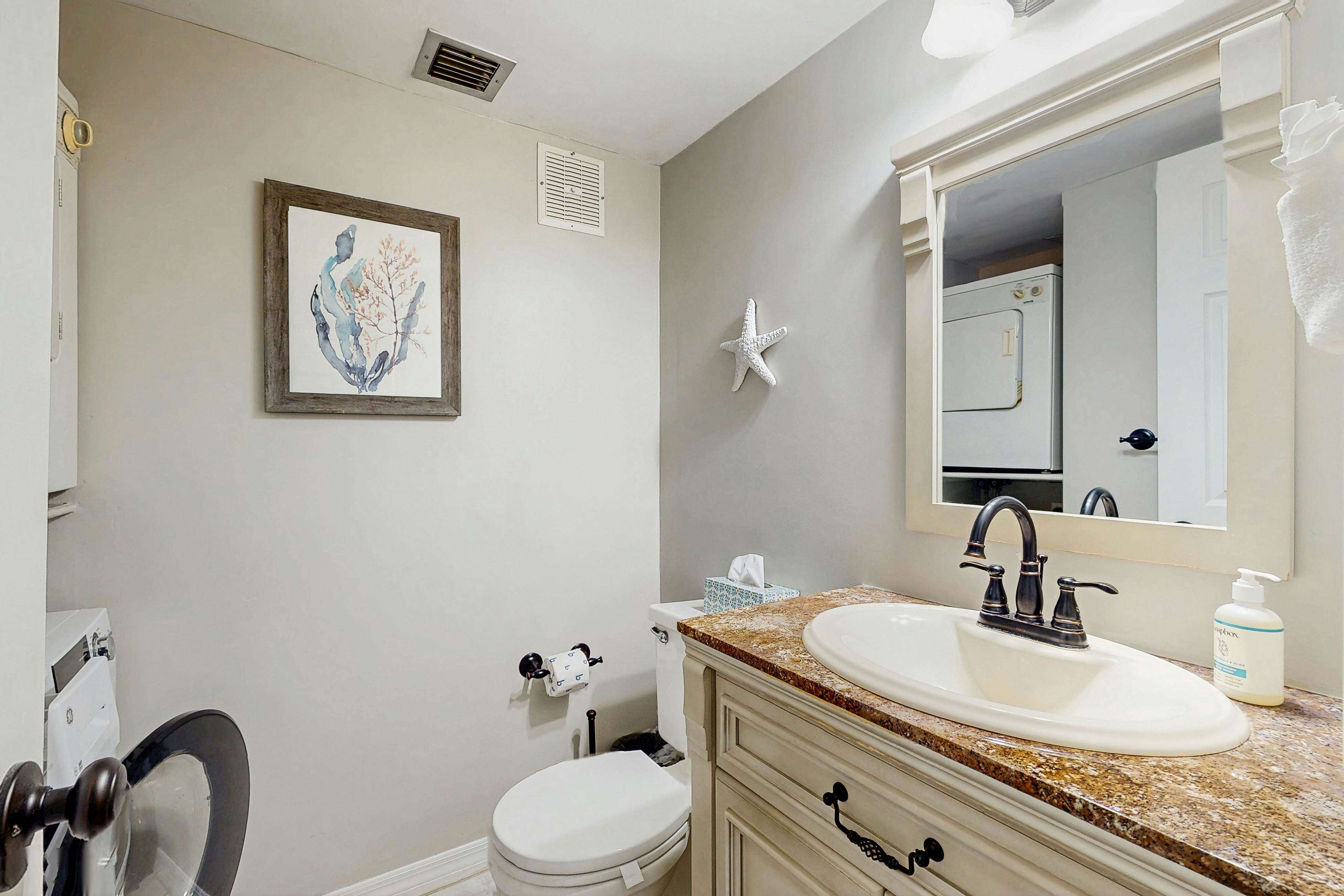 Water-view condo with balcony, grill, heated pool, hot tub, & sauna - walk to beach