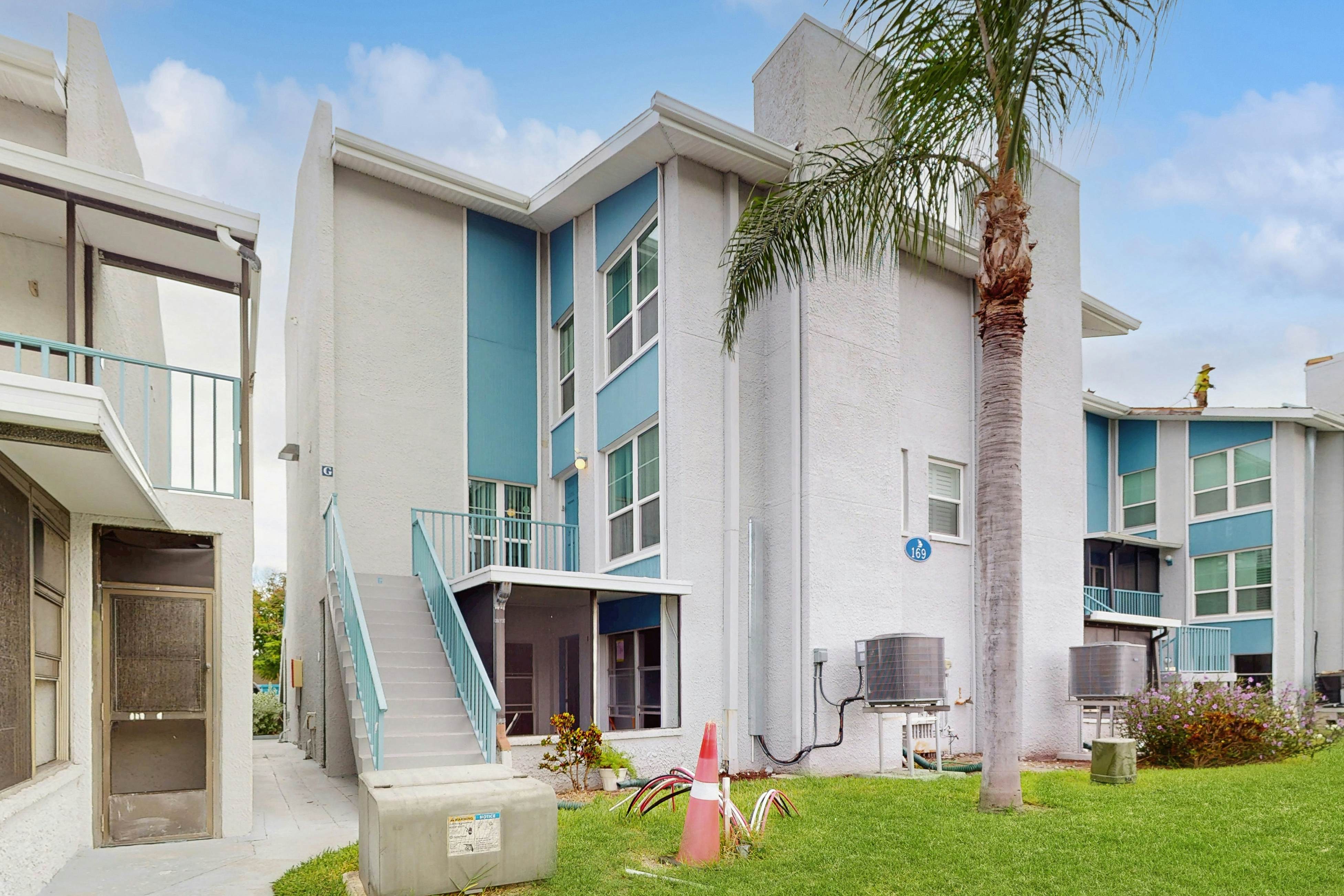 Water-view condo with balcony, grill, heated pool, hot tub, & sauna - walk to beach