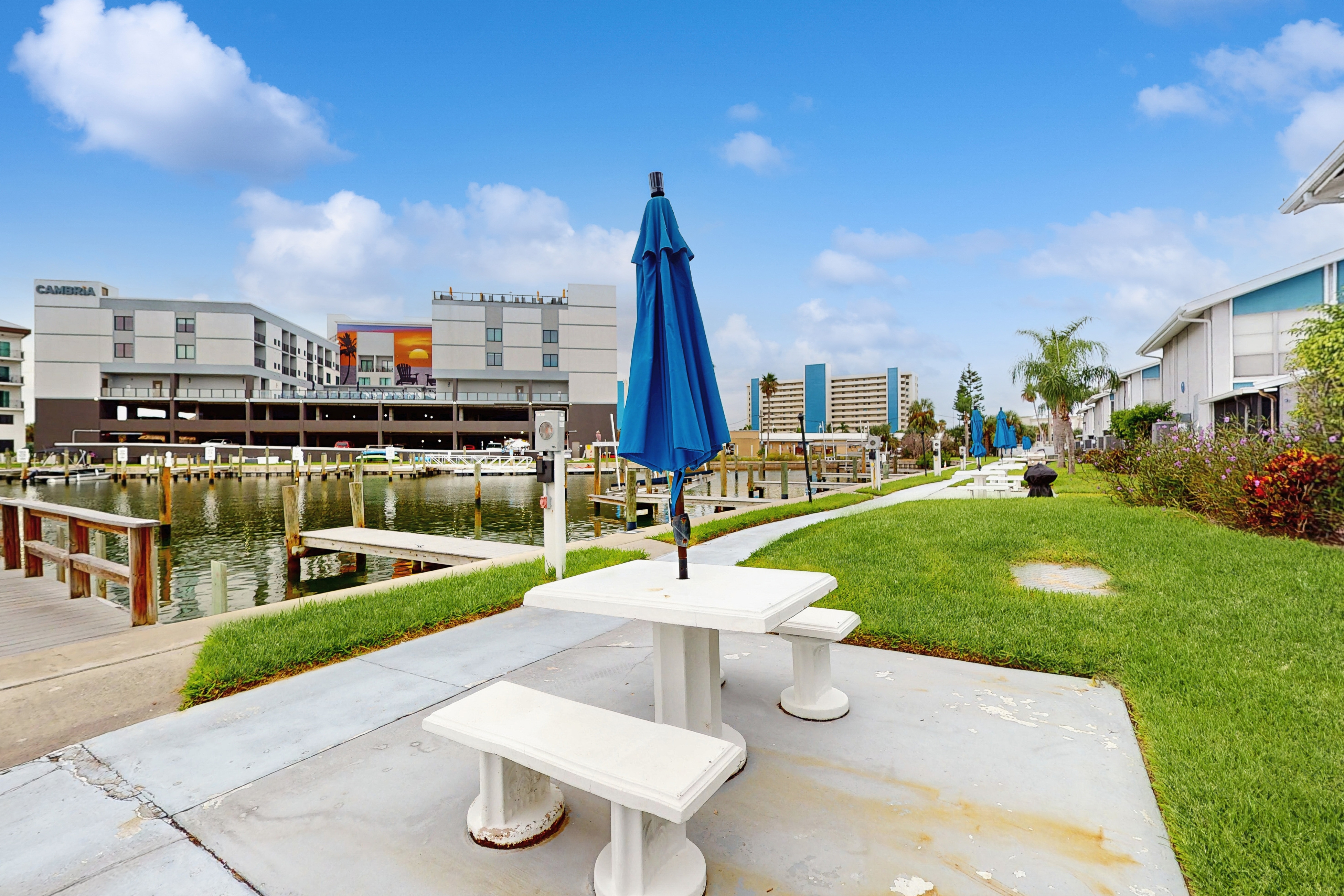 Water view condo with balcony grill heated pool hot tub and sauna walk to beach