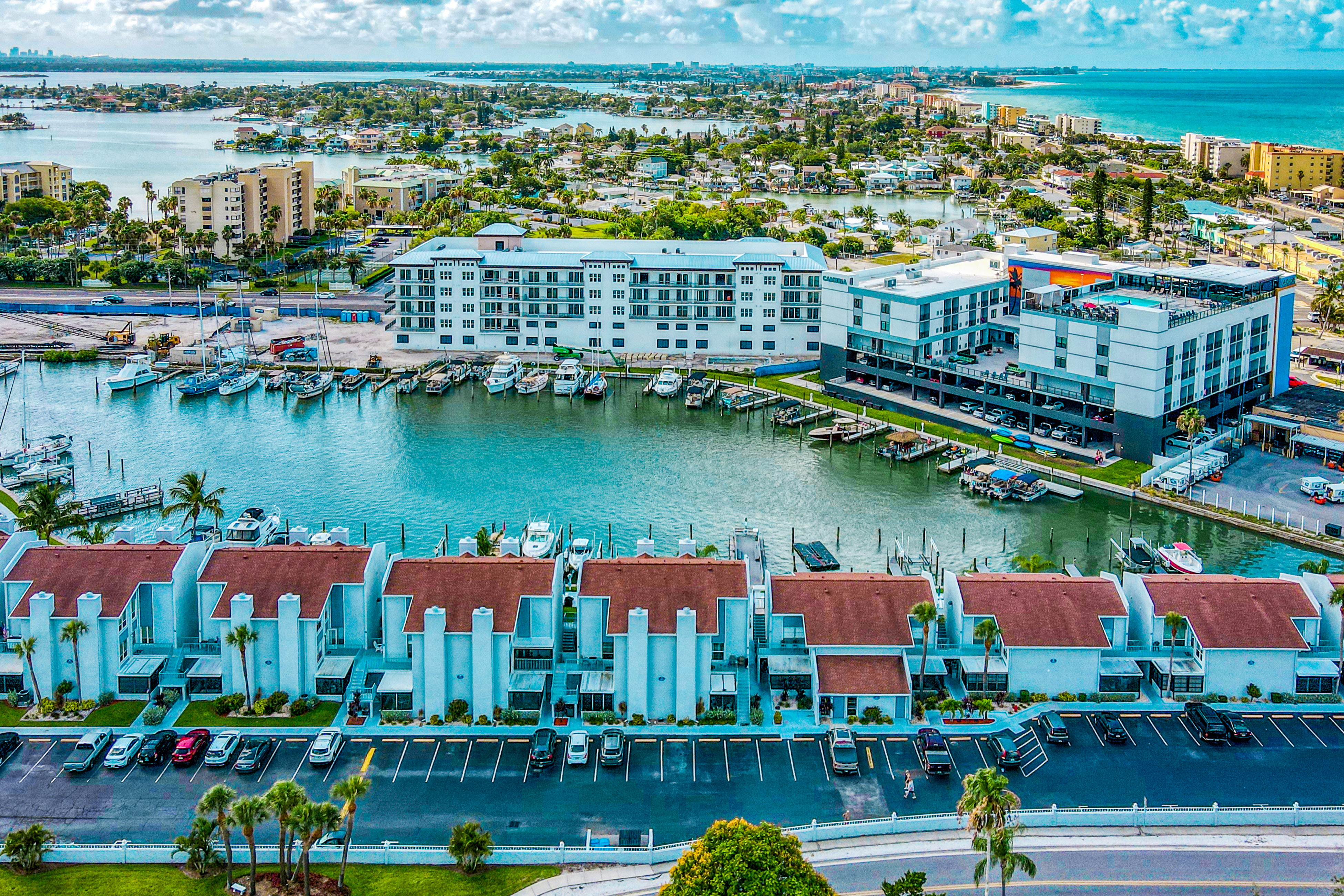 Water view condo with balcony grill heated pool hot tub and sauna walk to beach