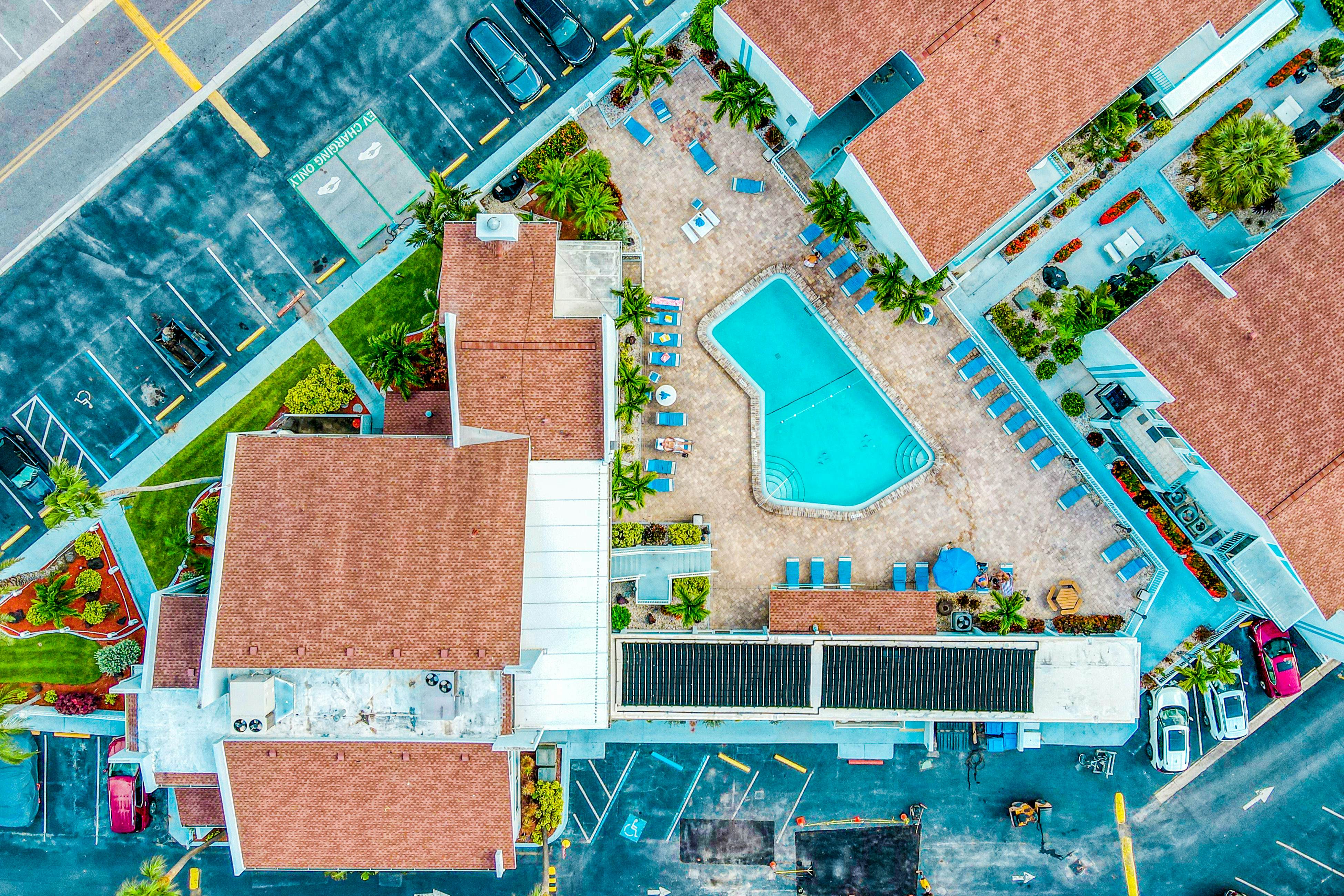 Water-view condo with balcony, grill, heated pool, hot tub, & sauna - walk to beach