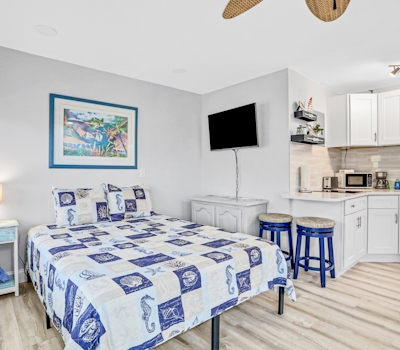 Beachfront studio with grilling area and shuffleboard steps to sand