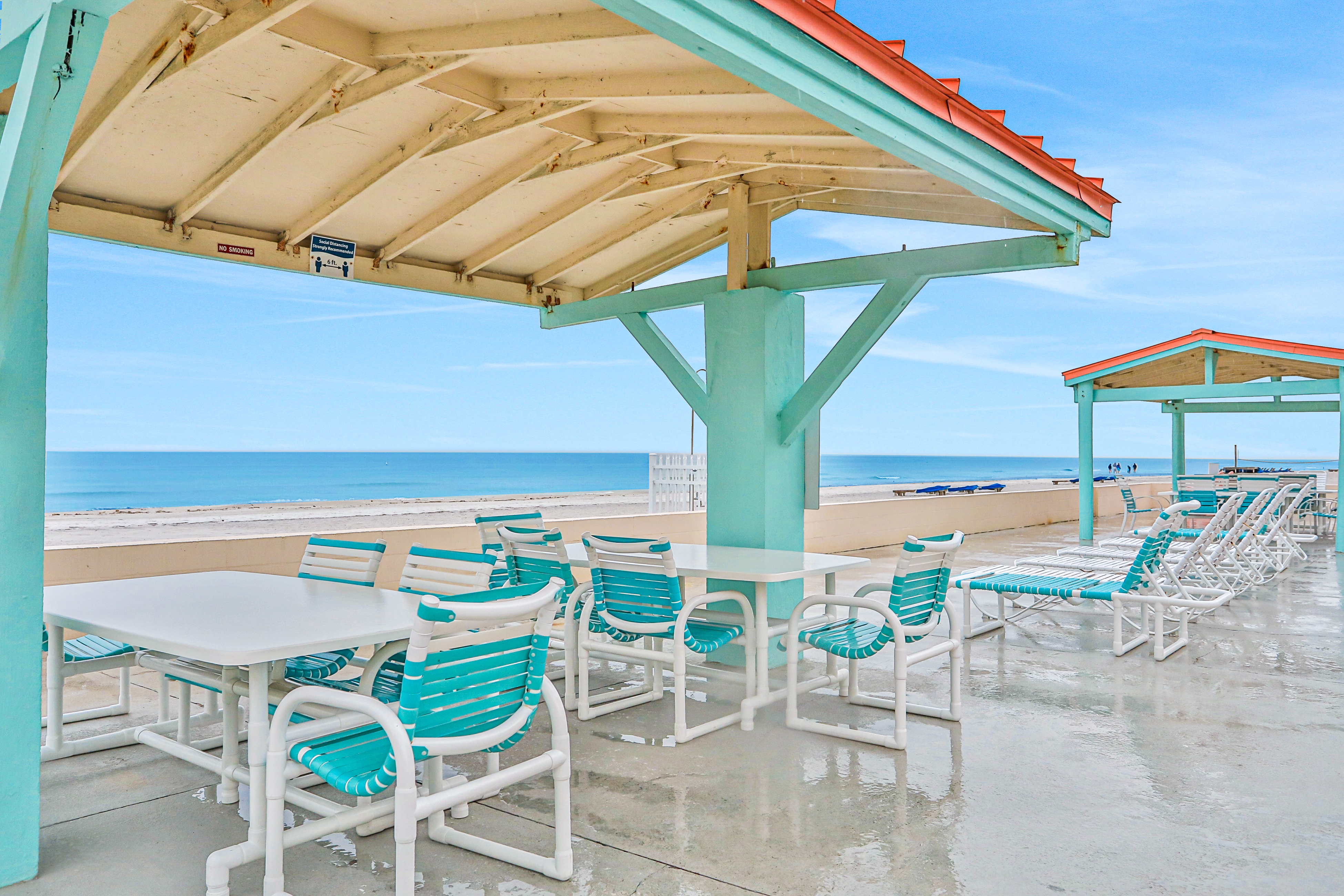 Beachfront studio with grilling area and shuffleboard steps to sand