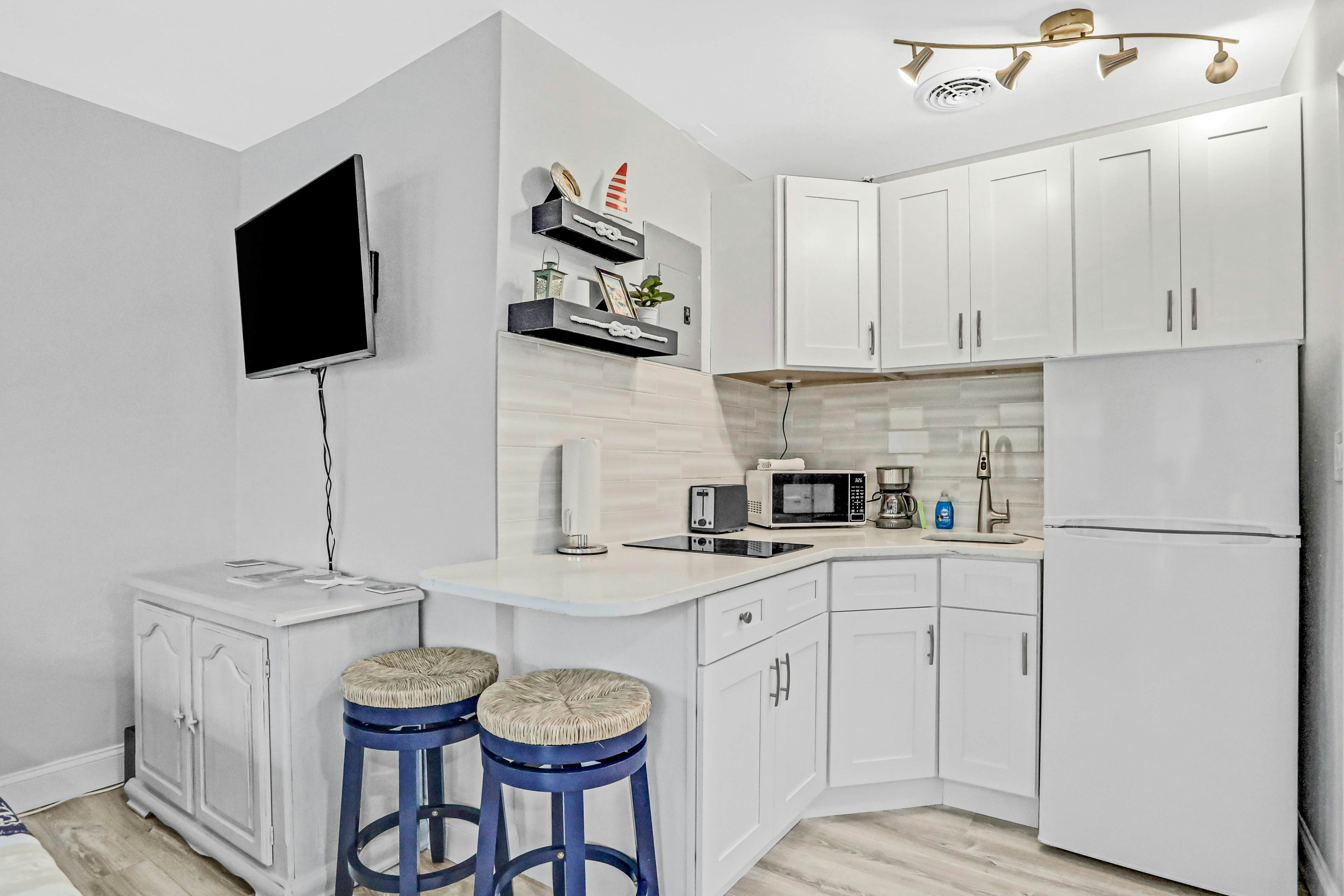 Beachfront studio with grilling area & shuffleboard - steps to sand