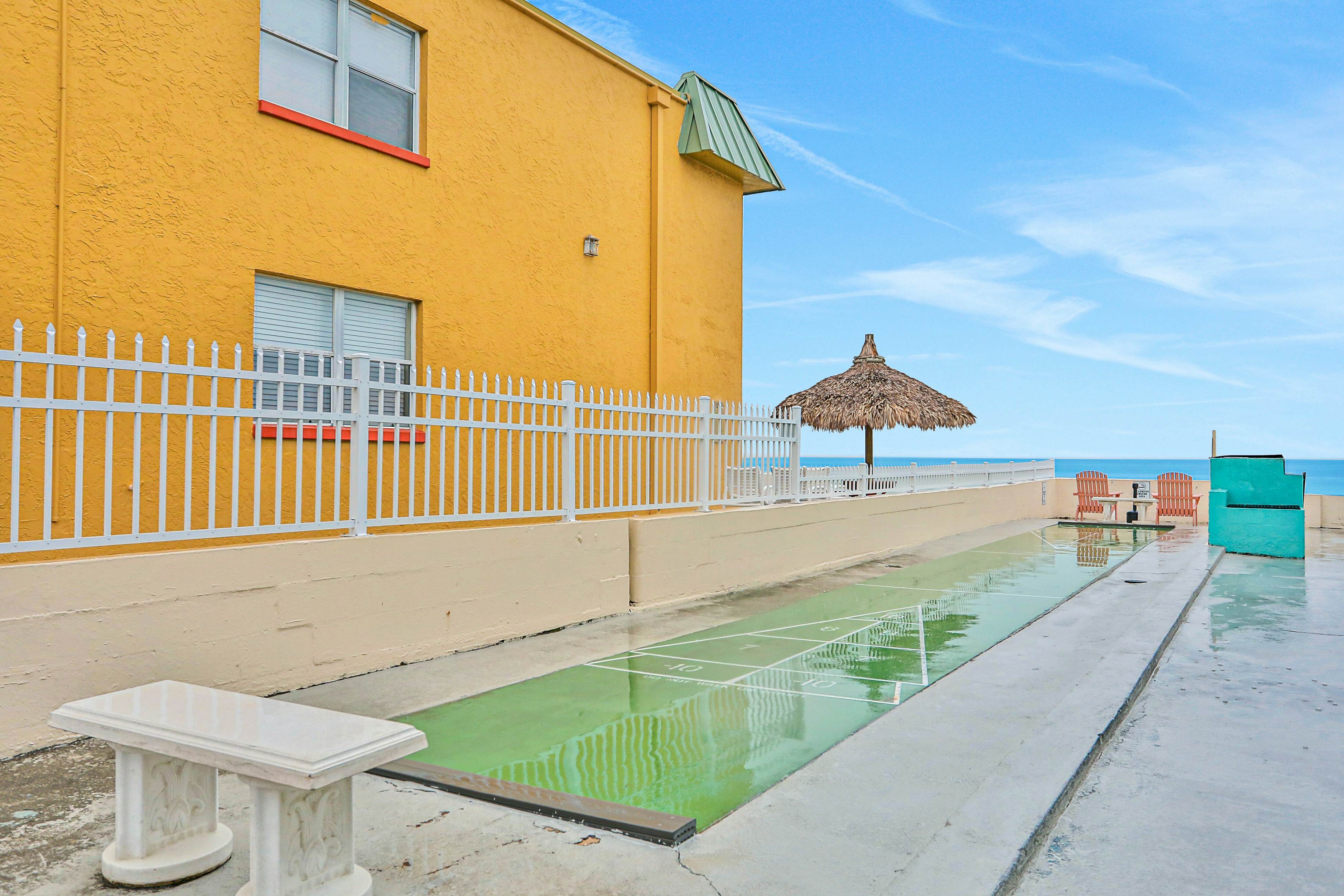 Beachfront studio with grilling area & shuffleboard - steps to sand