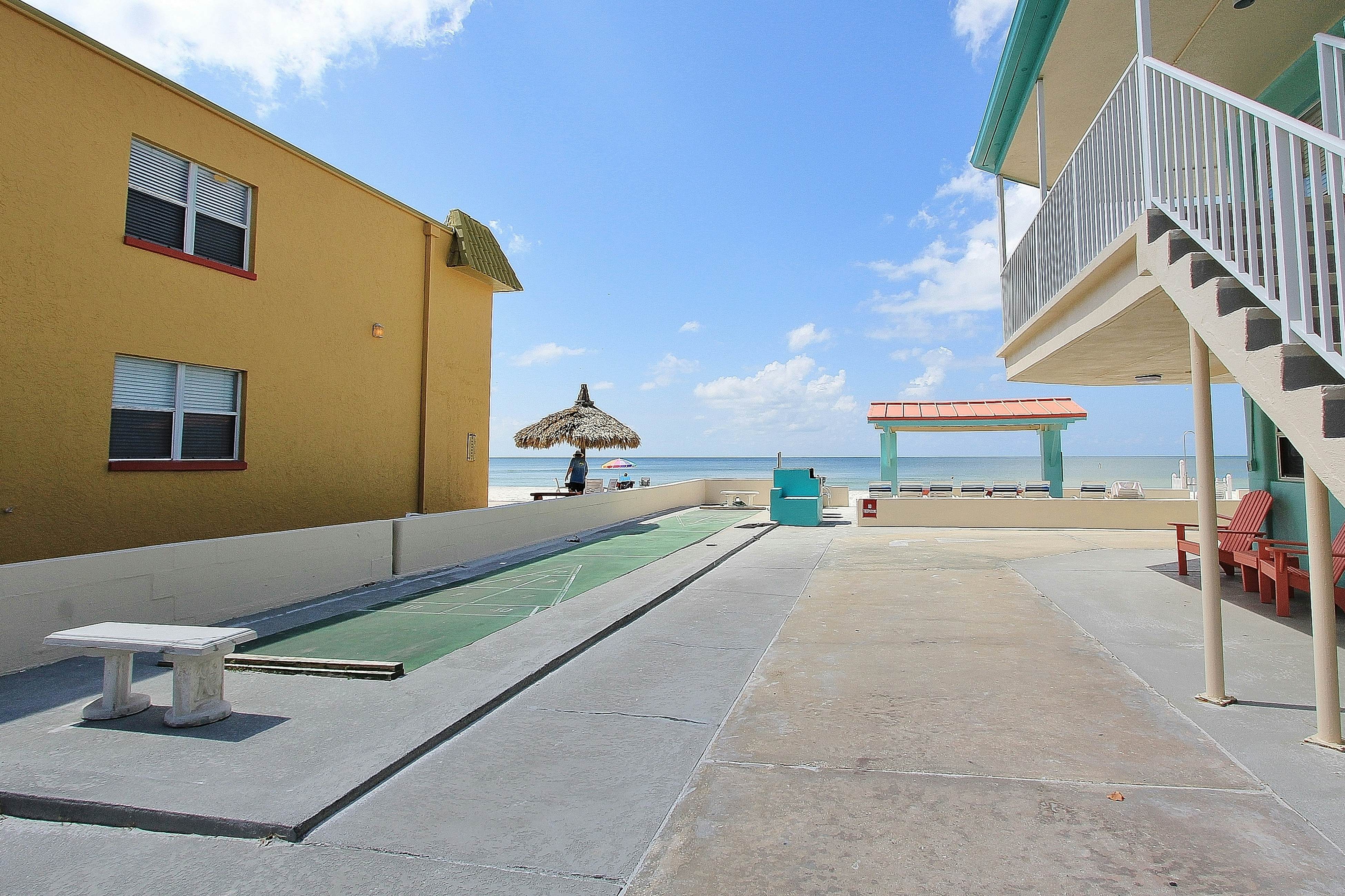 Beachfront studio with grilling area & shuffleboard - steps to sand