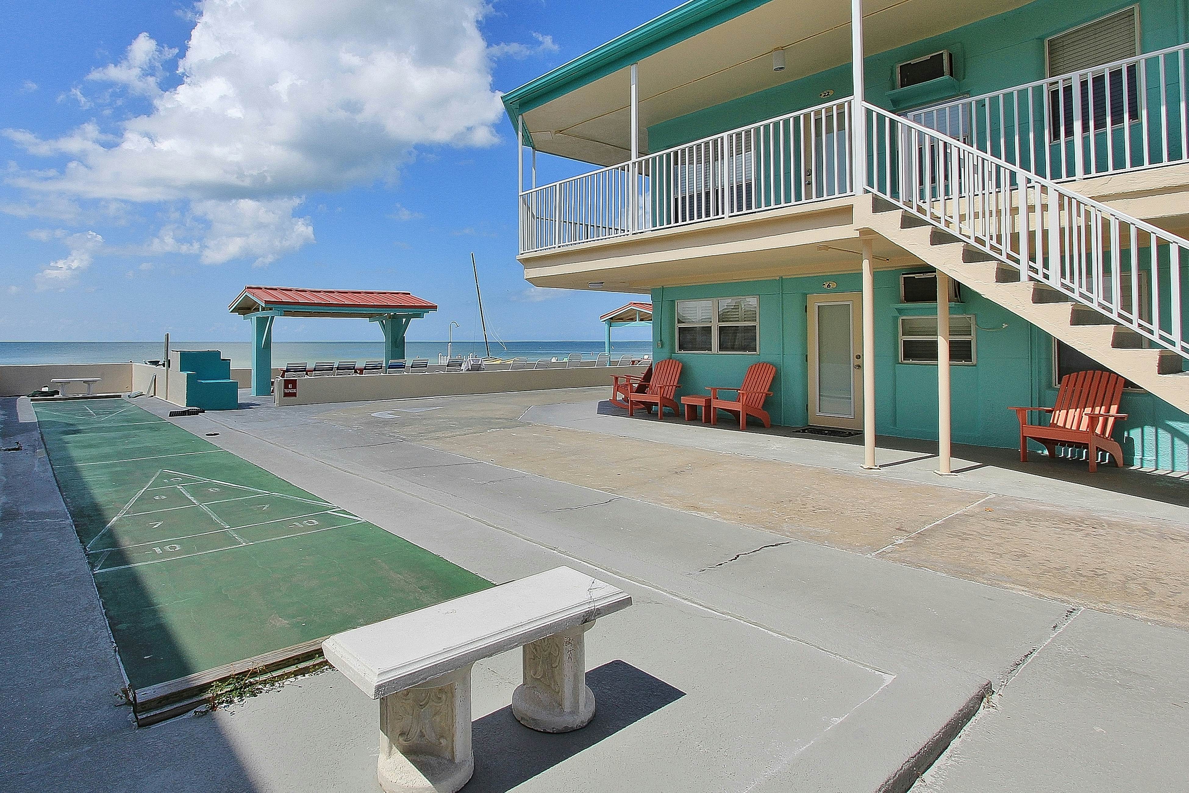 Beachfront studio with grilling area & shuffleboard - steps to sand